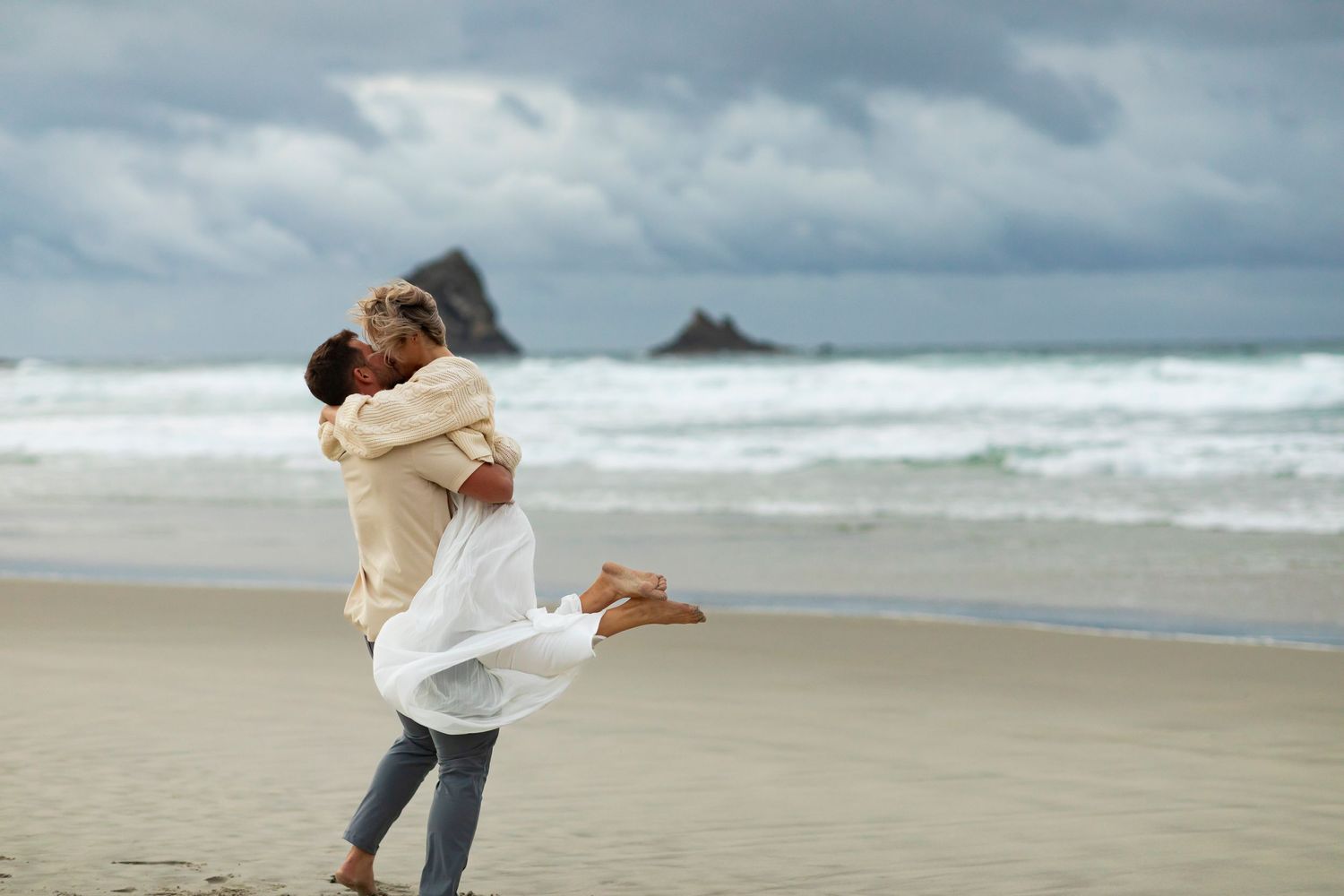destination photoshoot of beach engagement new zealand she said yes