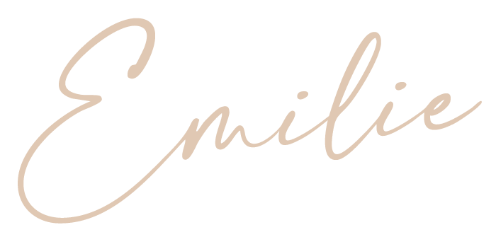 Elegant handwritten calligraphy in light brown ink flows across white paper with decorative flourishes.