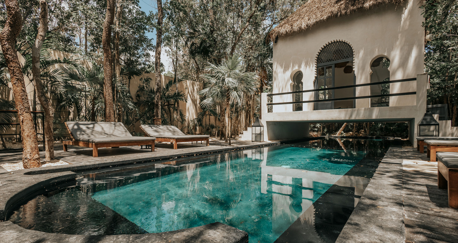 A serene luxury resort retreat featuring multiple angles of a tranquil swimming pool nestled among lush tropical gardens.
