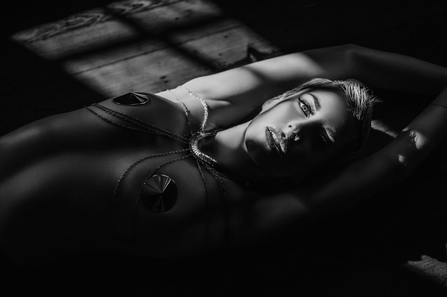 intimate black and white boudoir photography session in New Orleans luxury studio