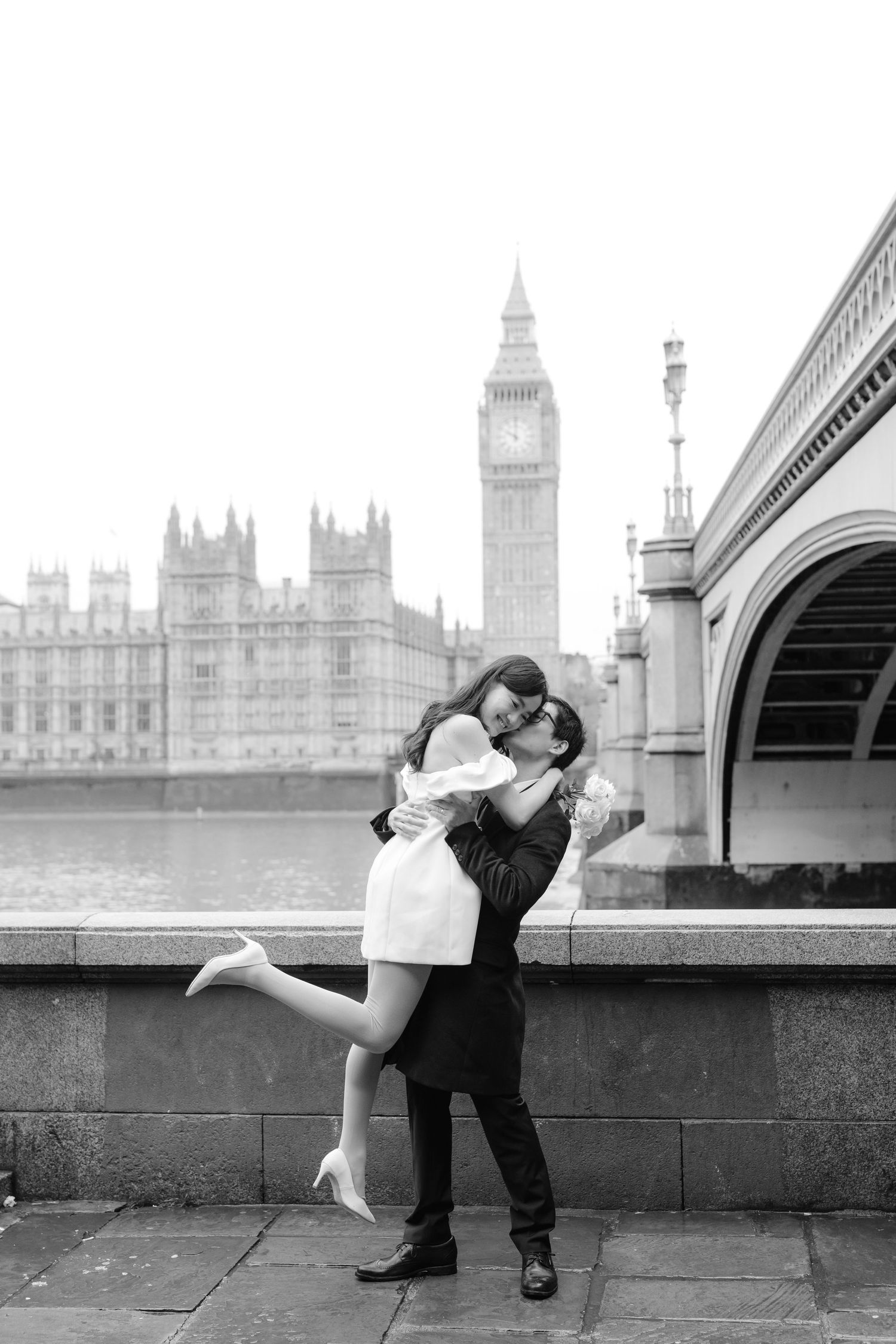 A romantic series of photos showing a couple embracing near London's Big Ben and Houses of Parliament.