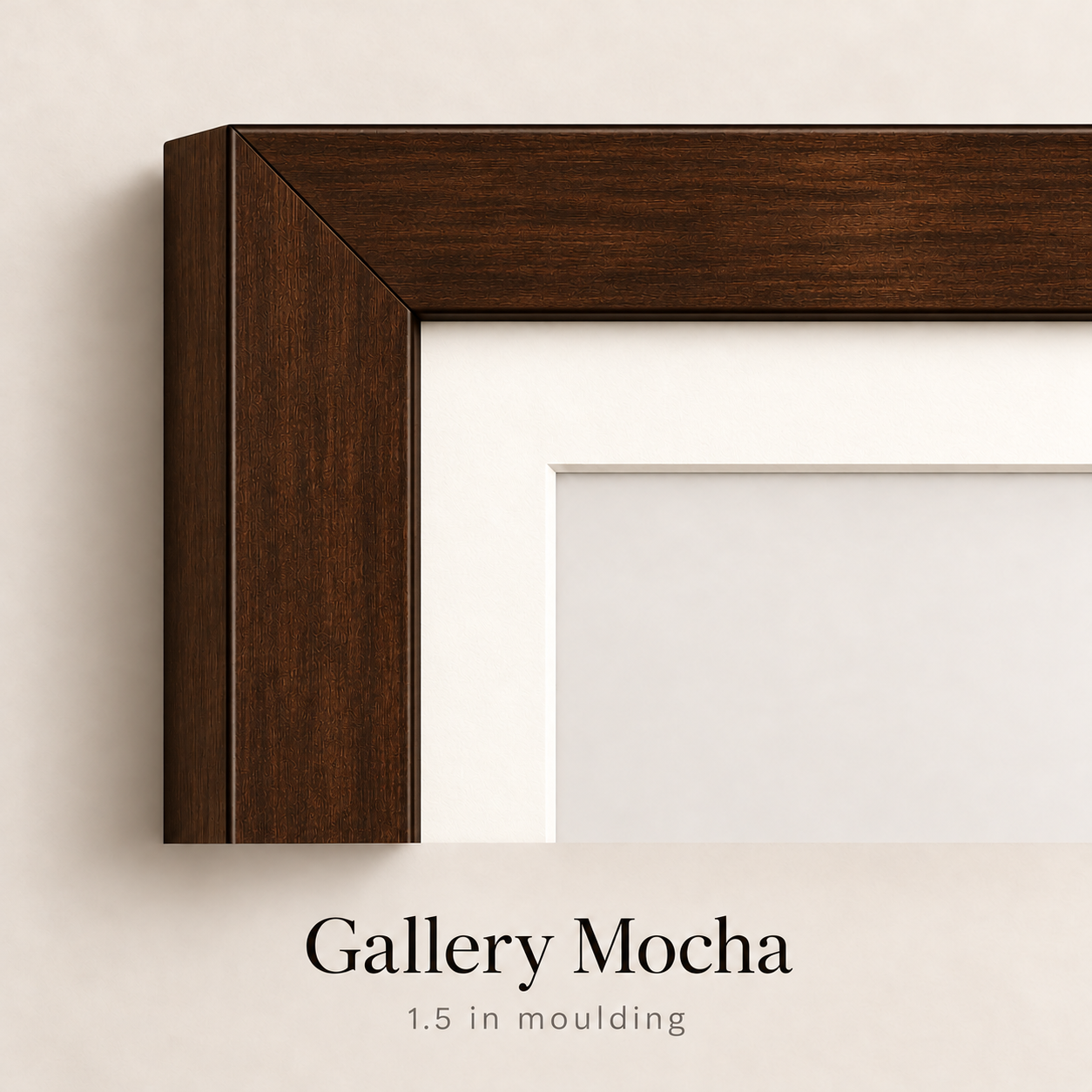 Close-up corner of a dark brown Gallery Mocha wood picture frame with 1.5 inch moulding and a white mat on a neutral background.