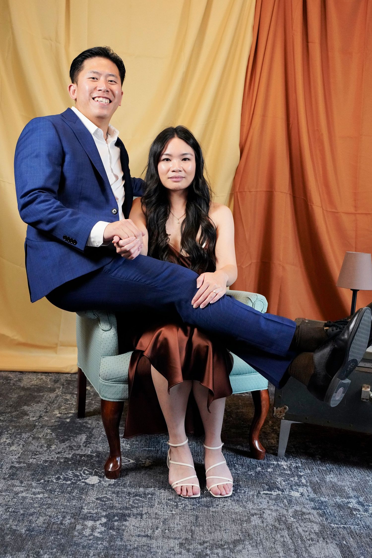 A series of cropped photos showing legs and feet of people seated on a bench against a beige backdrop.