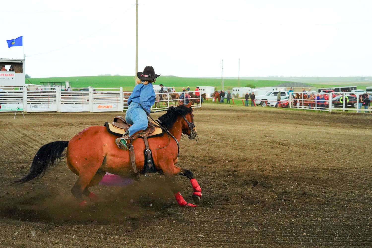 A sequence of equestrian barrel racing action shots showing riders navigating around barrels in a dusty arena.
