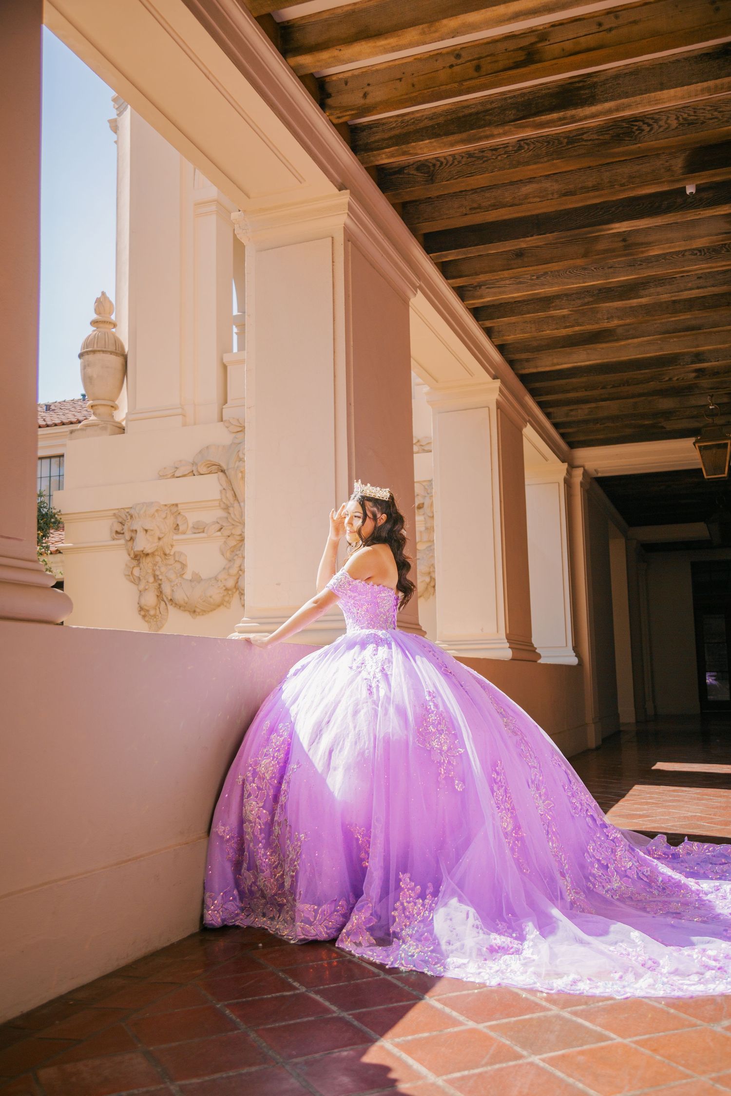 A flowing purple tulle dress train sweeps across a rustic tiled floor in a series of connected artistic photographs.