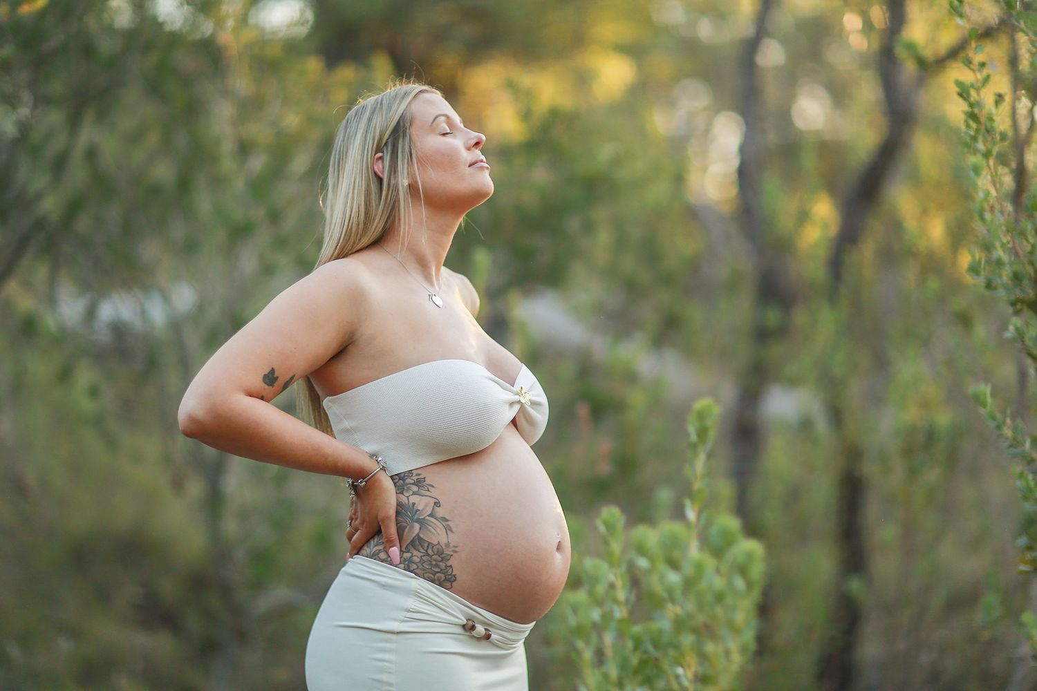 Maternity session in the bush at golden hour