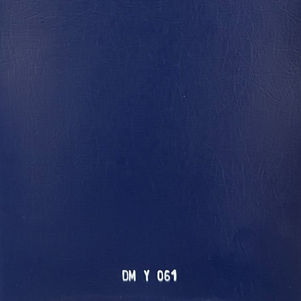 Royal blue leather fabric swatch with natural grain texture, labeled DM Y 061.