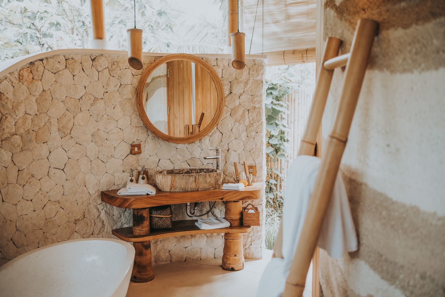 Open-air bathroom in an Earth Stone Villa at Solana Ubud