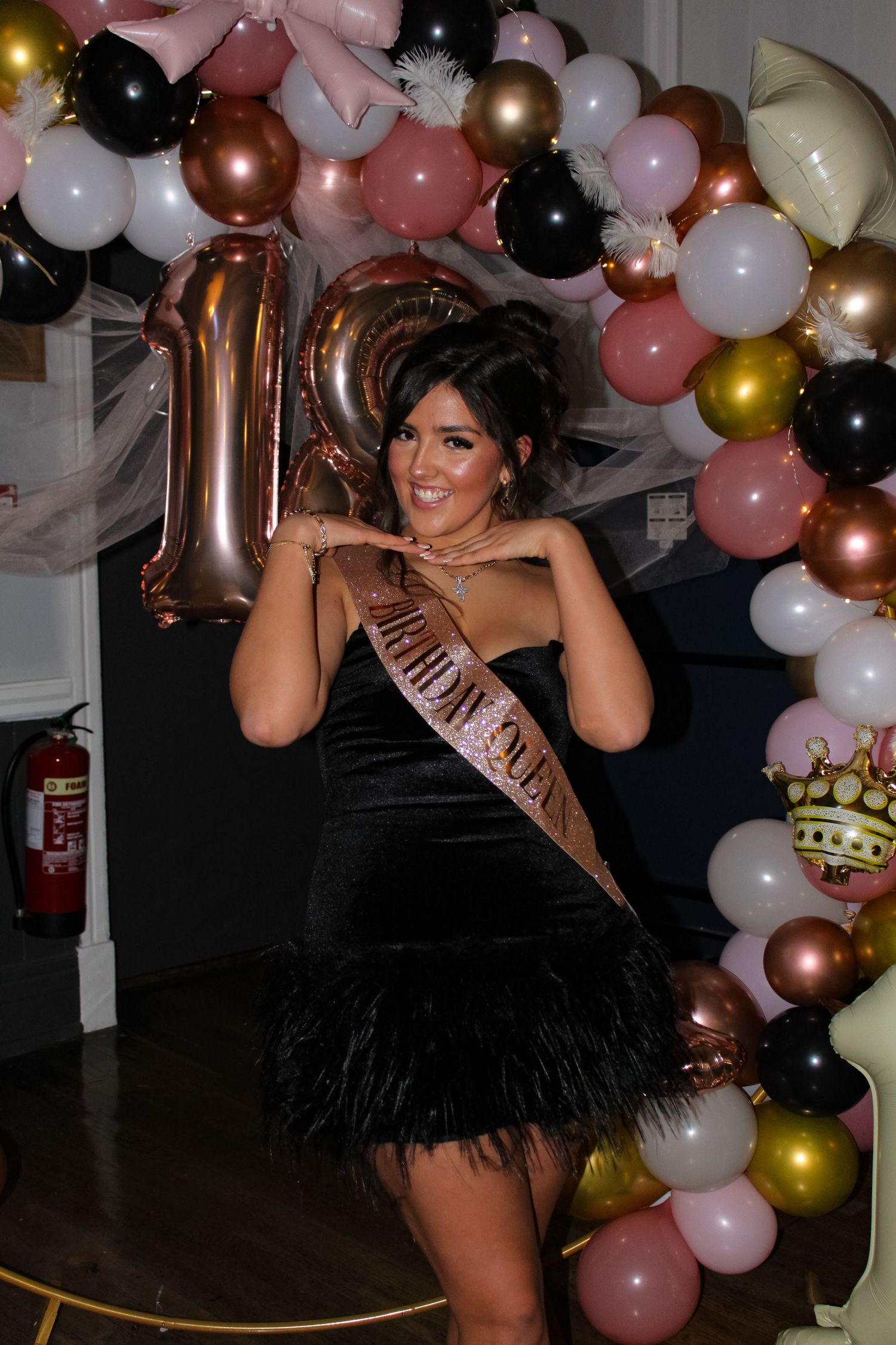 A portrait photo of the birthday girl at an 18th Birthday party.