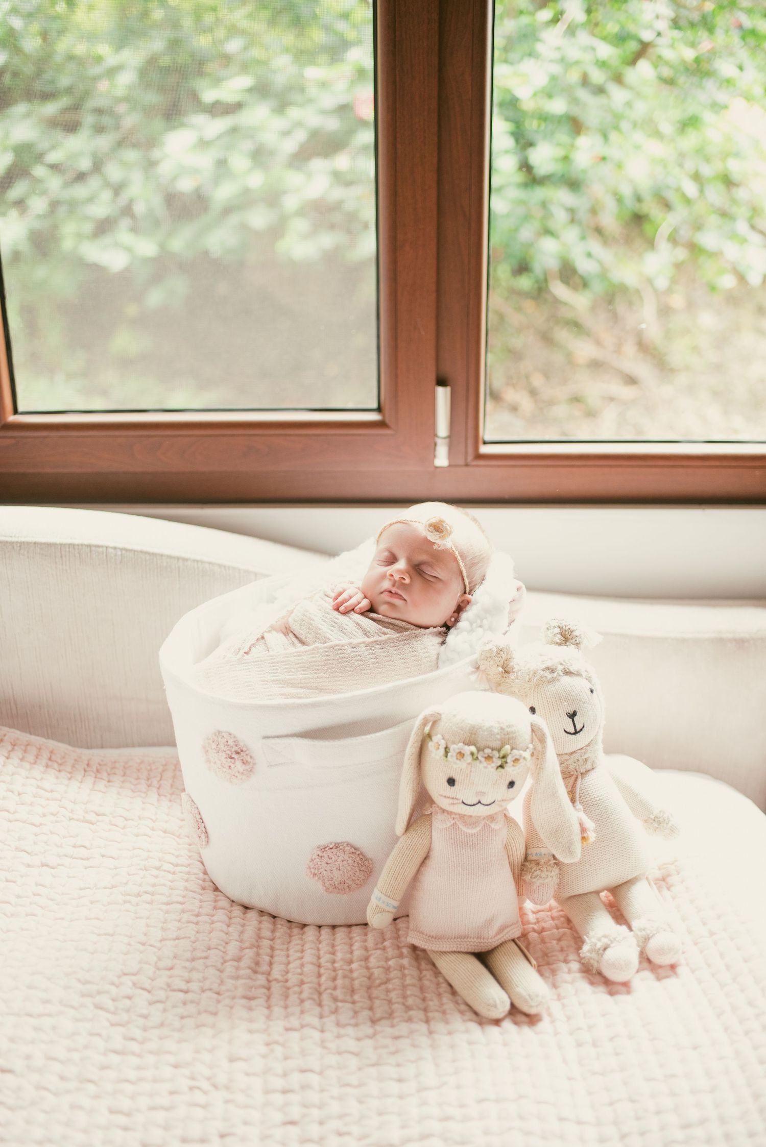 A series of soft, muted photos showing a white ceramic teacup with a small plush toy on a textured surface.