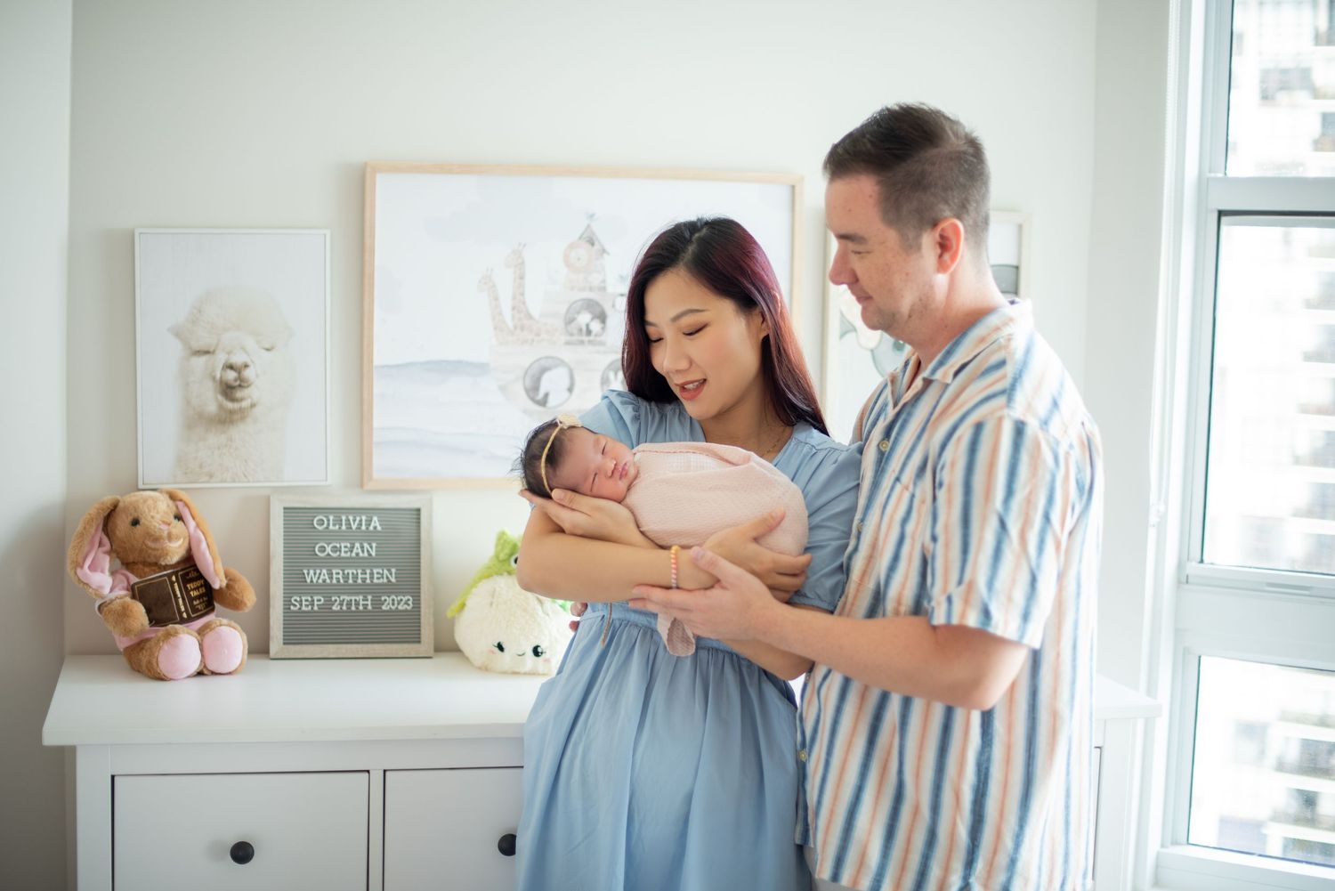 A series of tender moments between parents and their newborn baby in a bright nursery setting.