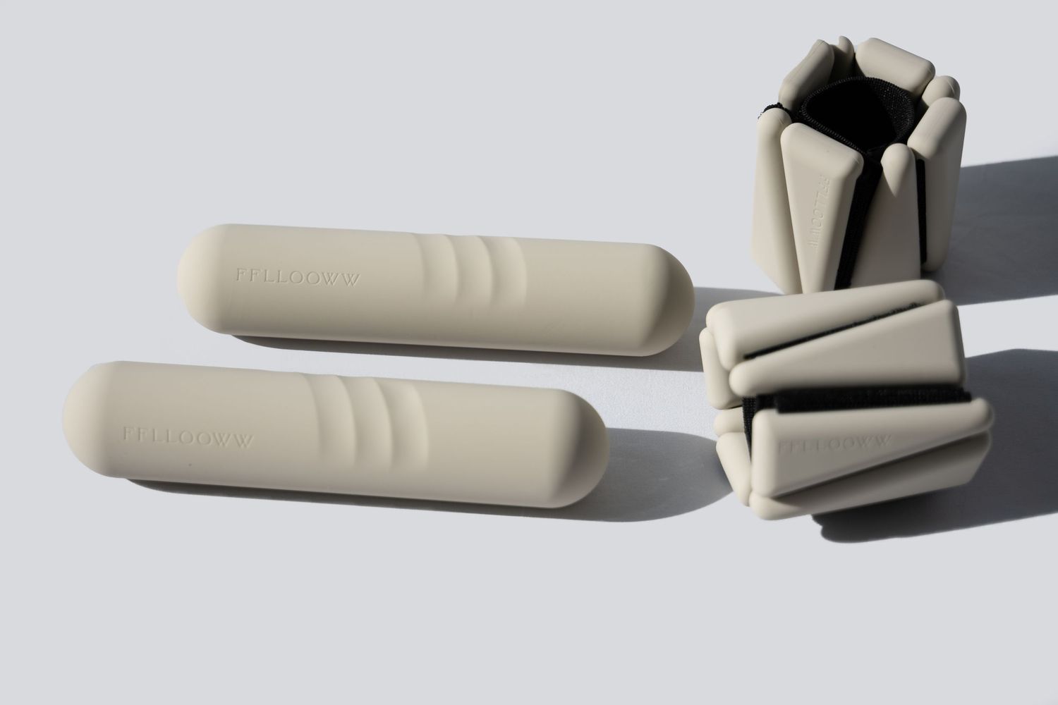 A white cylindrical foam cushion with ridges shown from multiple angles in a product photography sequence.