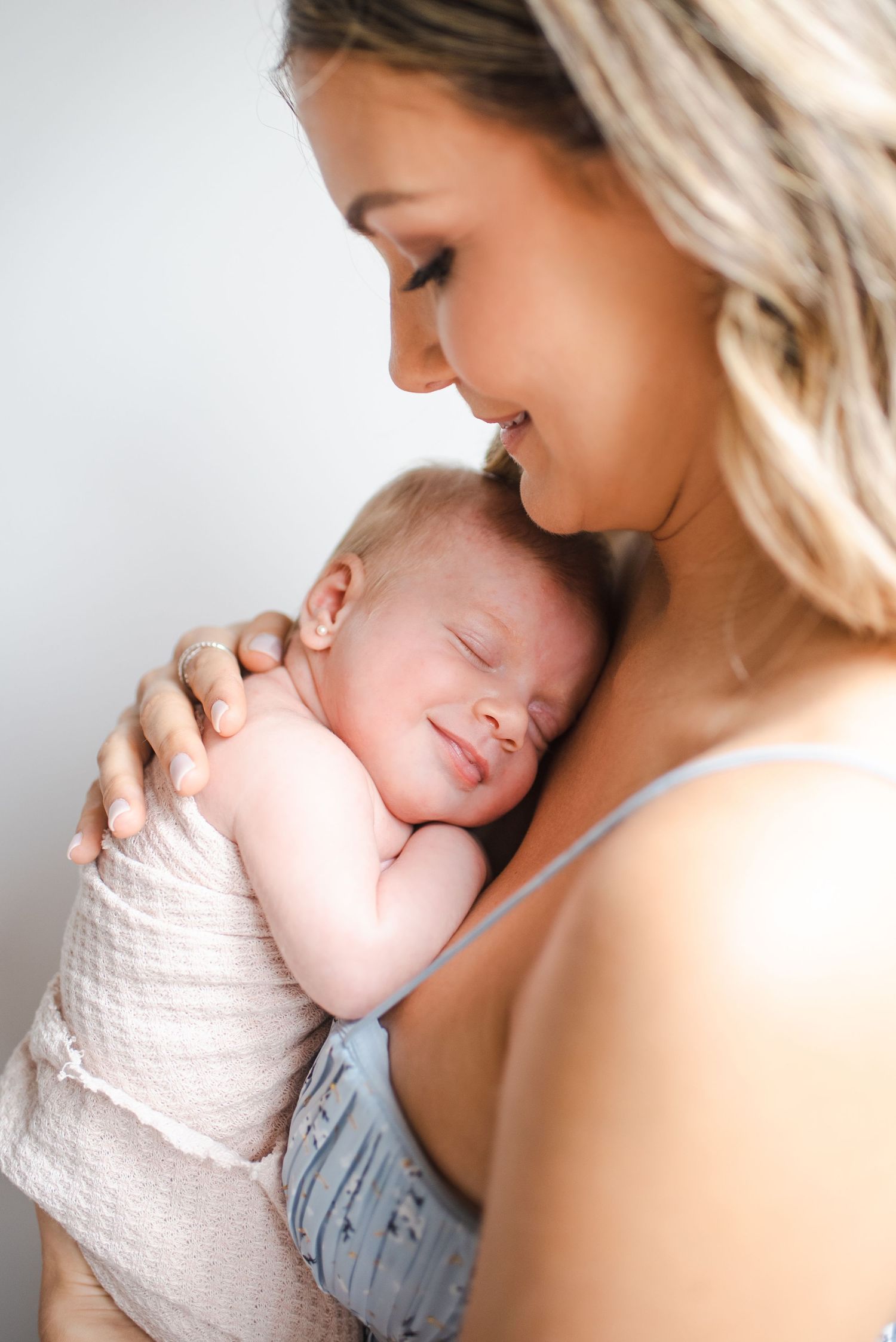 A tender moment captured in a series of intimate portraits showing gentle affection and care.
