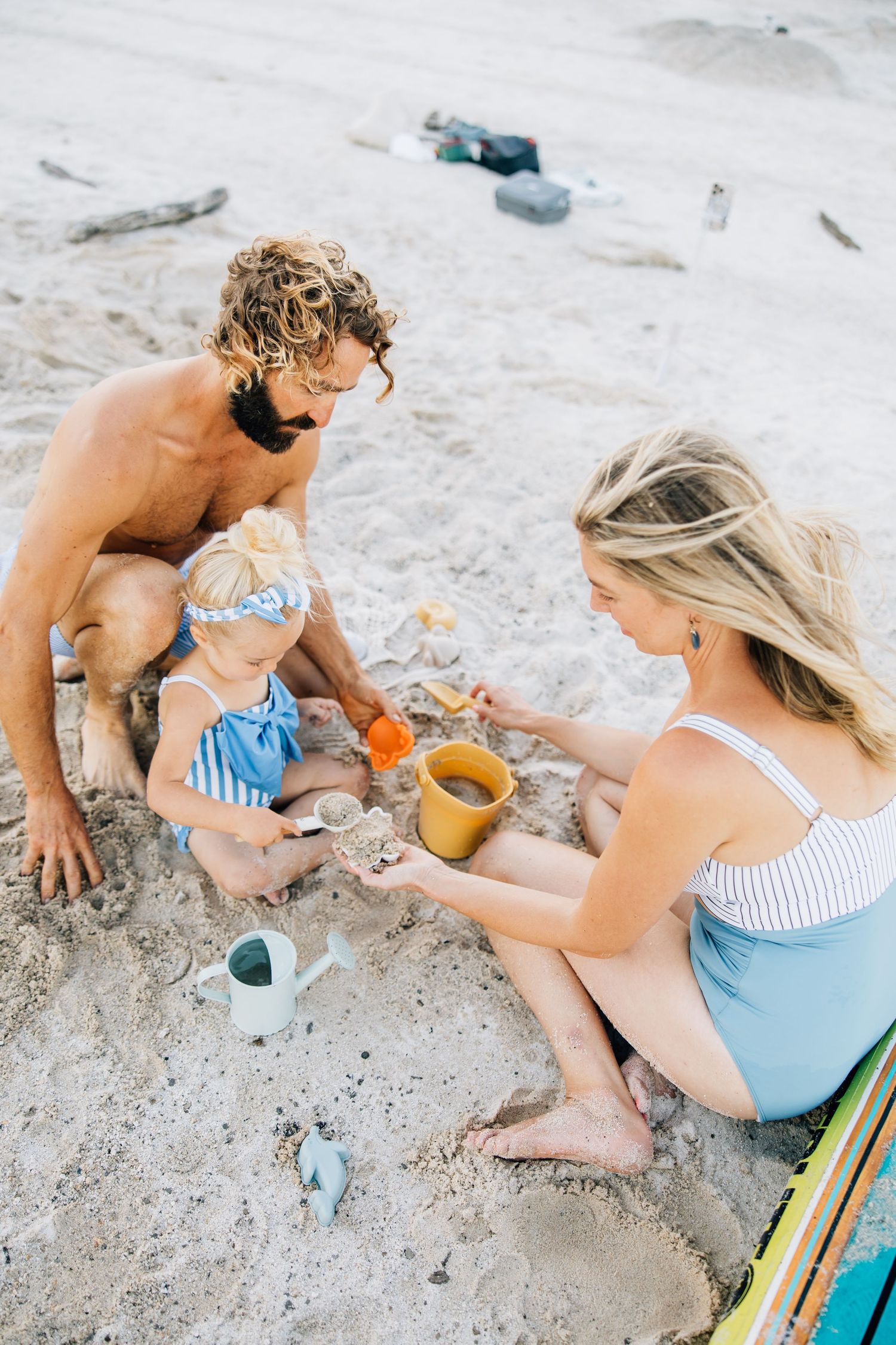 Golden sands, gentle waves, and laughter—this beach session captures authentic family connection and the beauty of moments together.