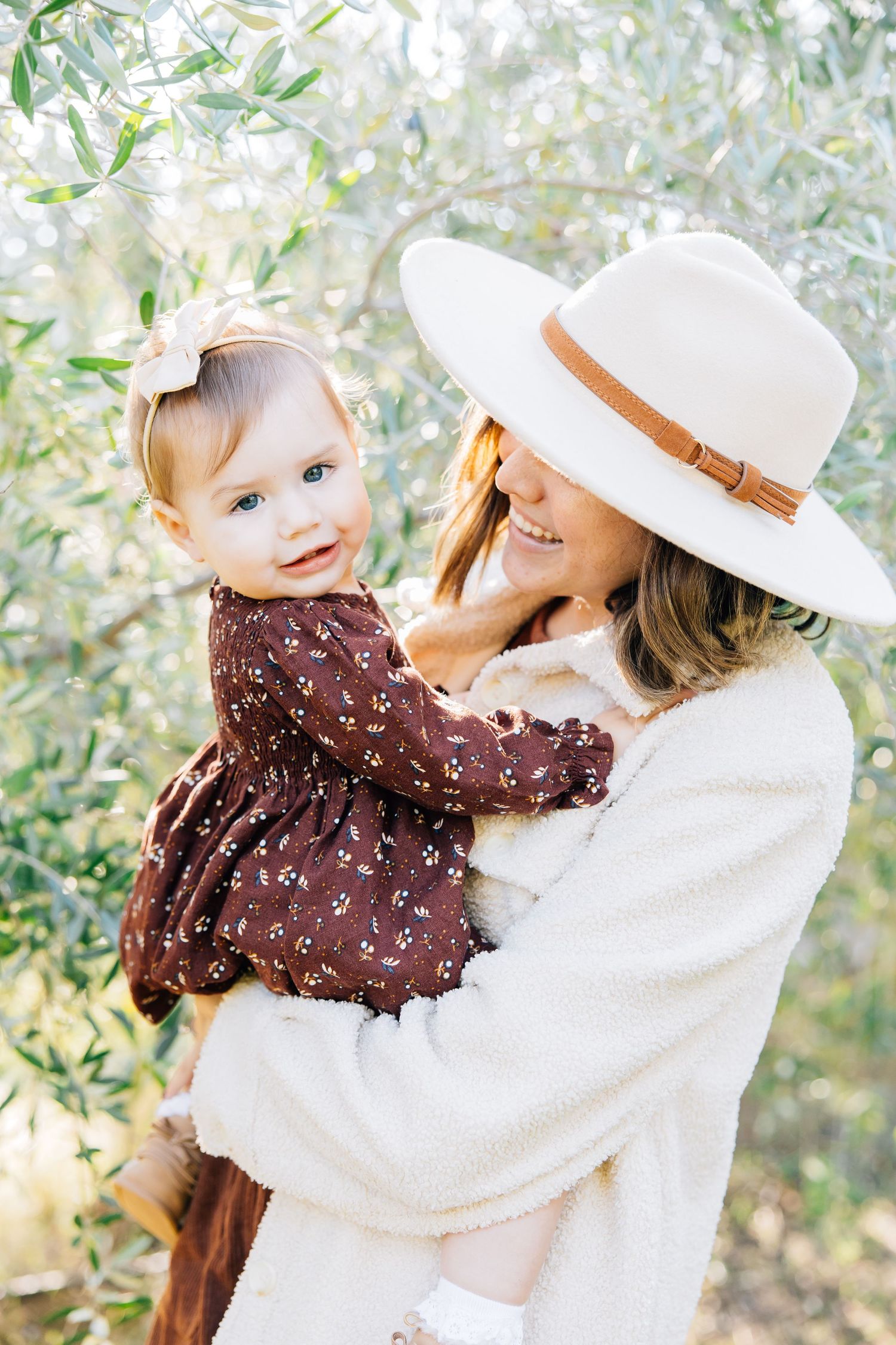 Motherhood unfolds in quiet, fleeting moments—the way tiny hands reach, the laughter that fills a room, the comfort found in familiar arms.