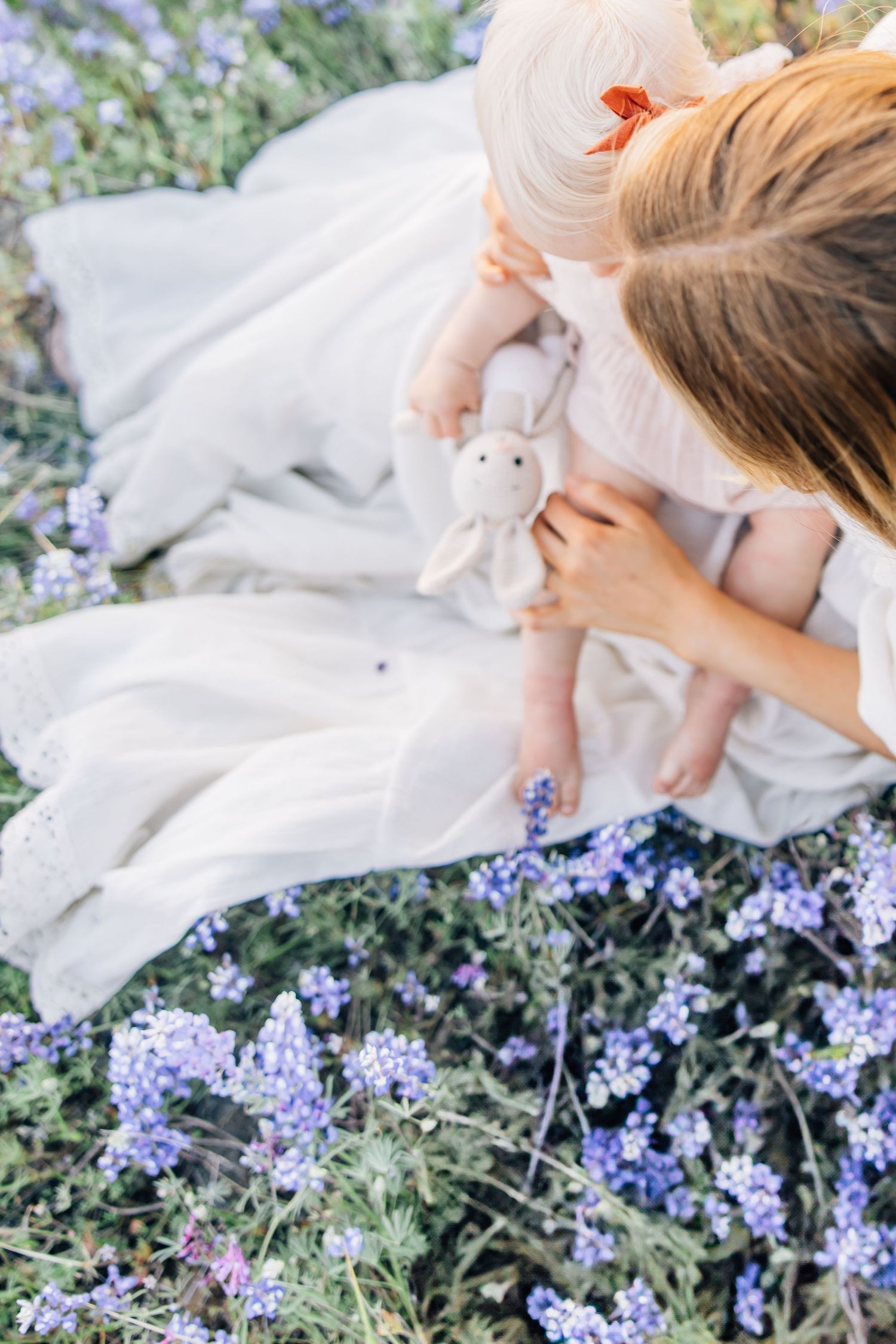 Motherhood unfolds in quiet, fleeting moments—the way tiny hands reach, the laughter that fills a room, the comfort found in familiar arms.