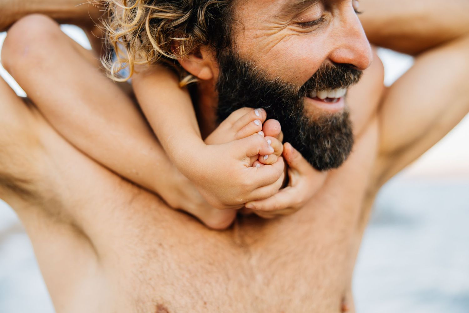 Golden sands, gentle waves, and laughter—this beach session captures authentic family connection and the beauty of moments together.