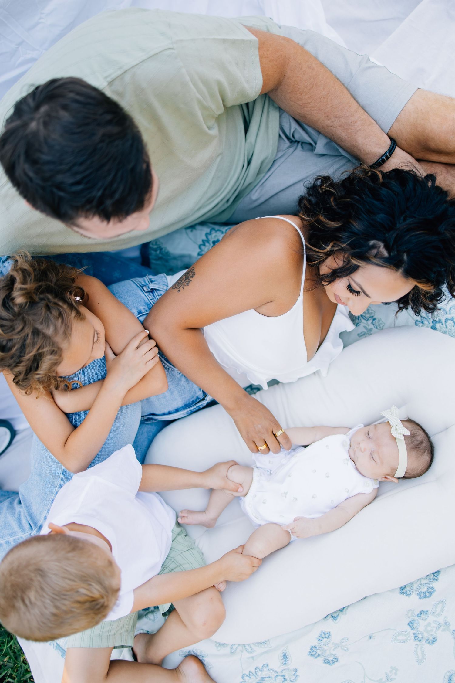 Motherhood unfolds in quiet, fleeting moments—the way tiny hands reach, the laughter that fills a room, the comfort found in familiar arms.