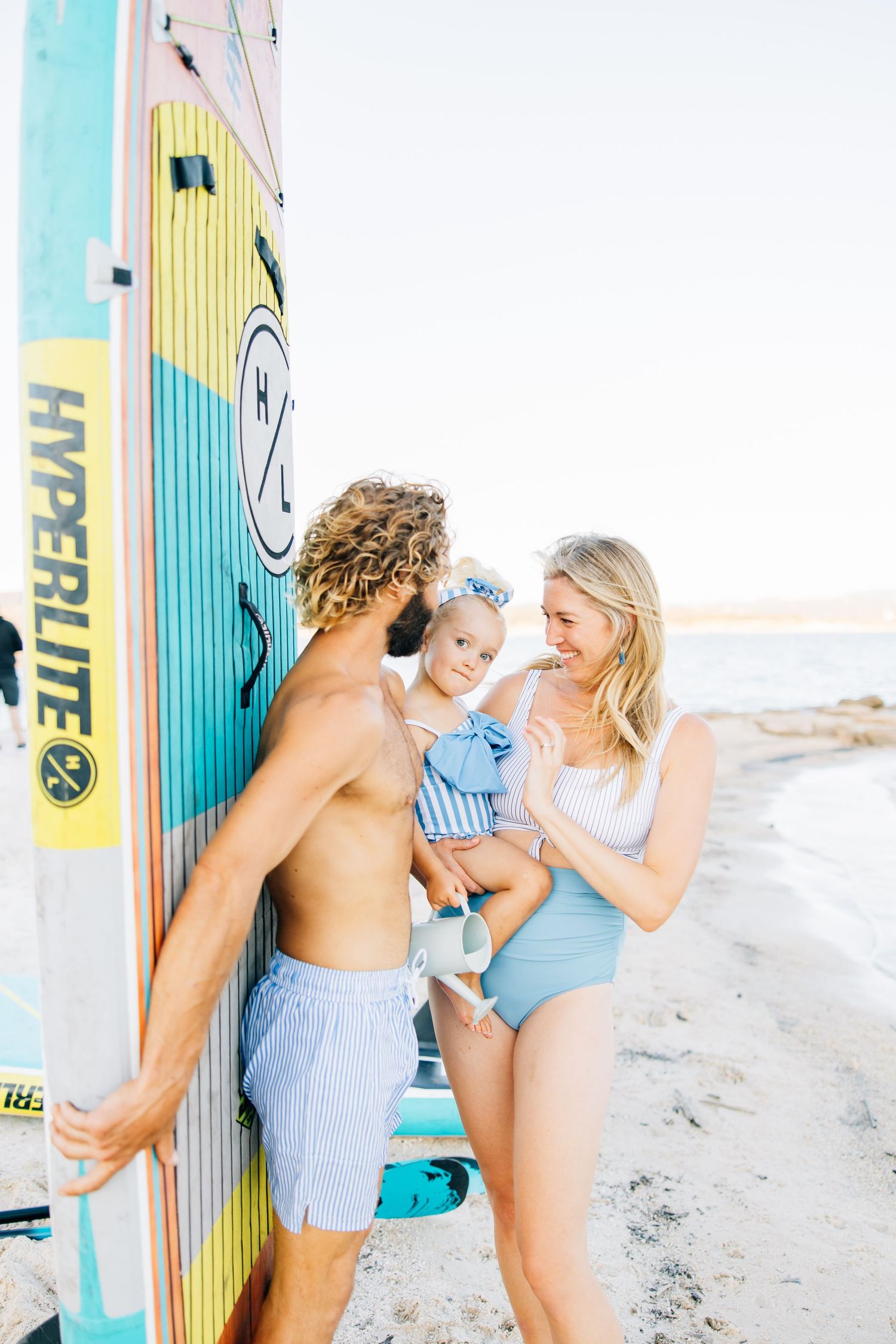 Golden sands, gentle waves, and laughter—this beach session captures authentic family connection and the beauty of moments together.
