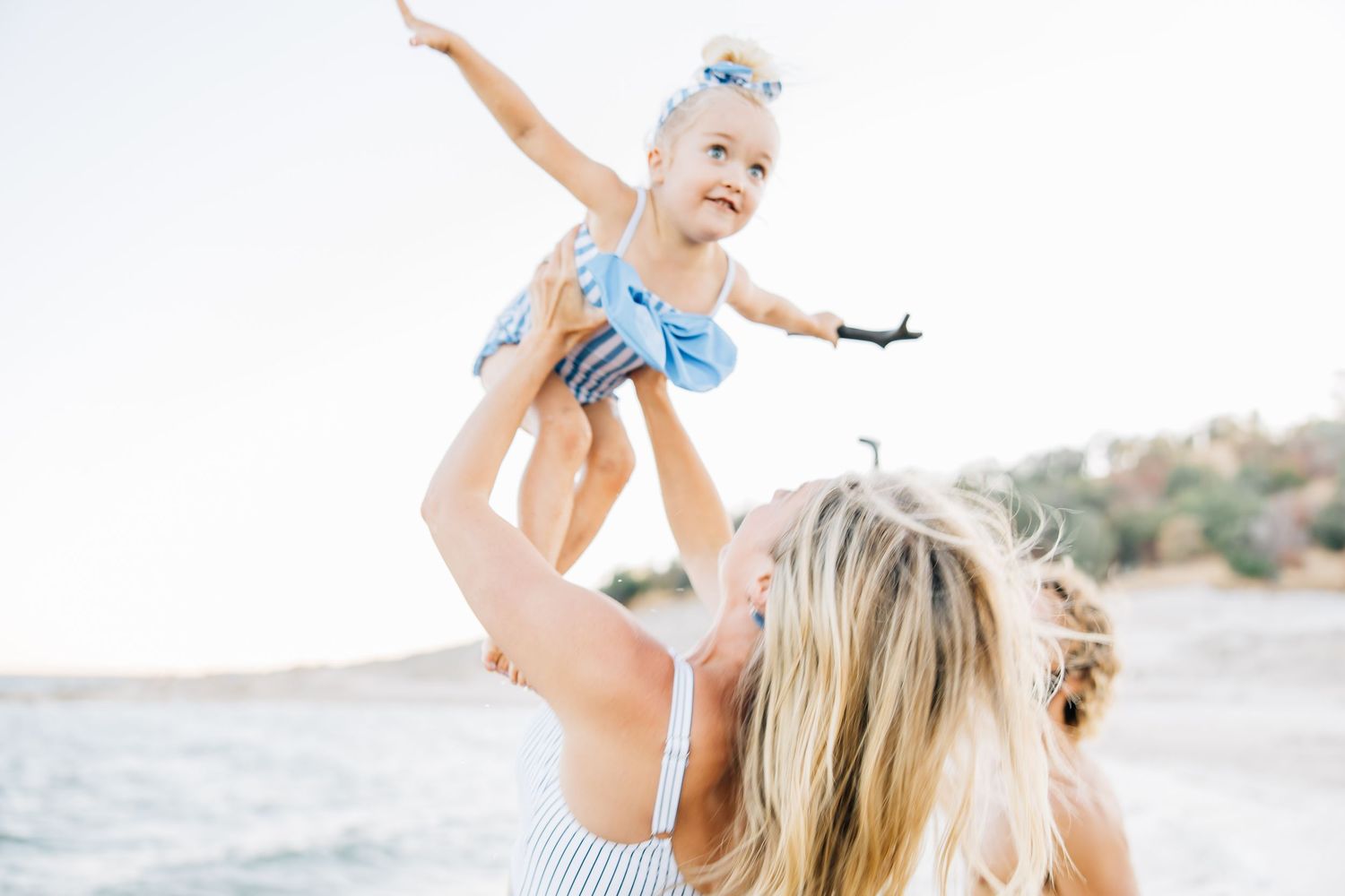 Golden sands, gentle waves, and laughter—this beach session captures authentic family connection and the beauty of moments together.