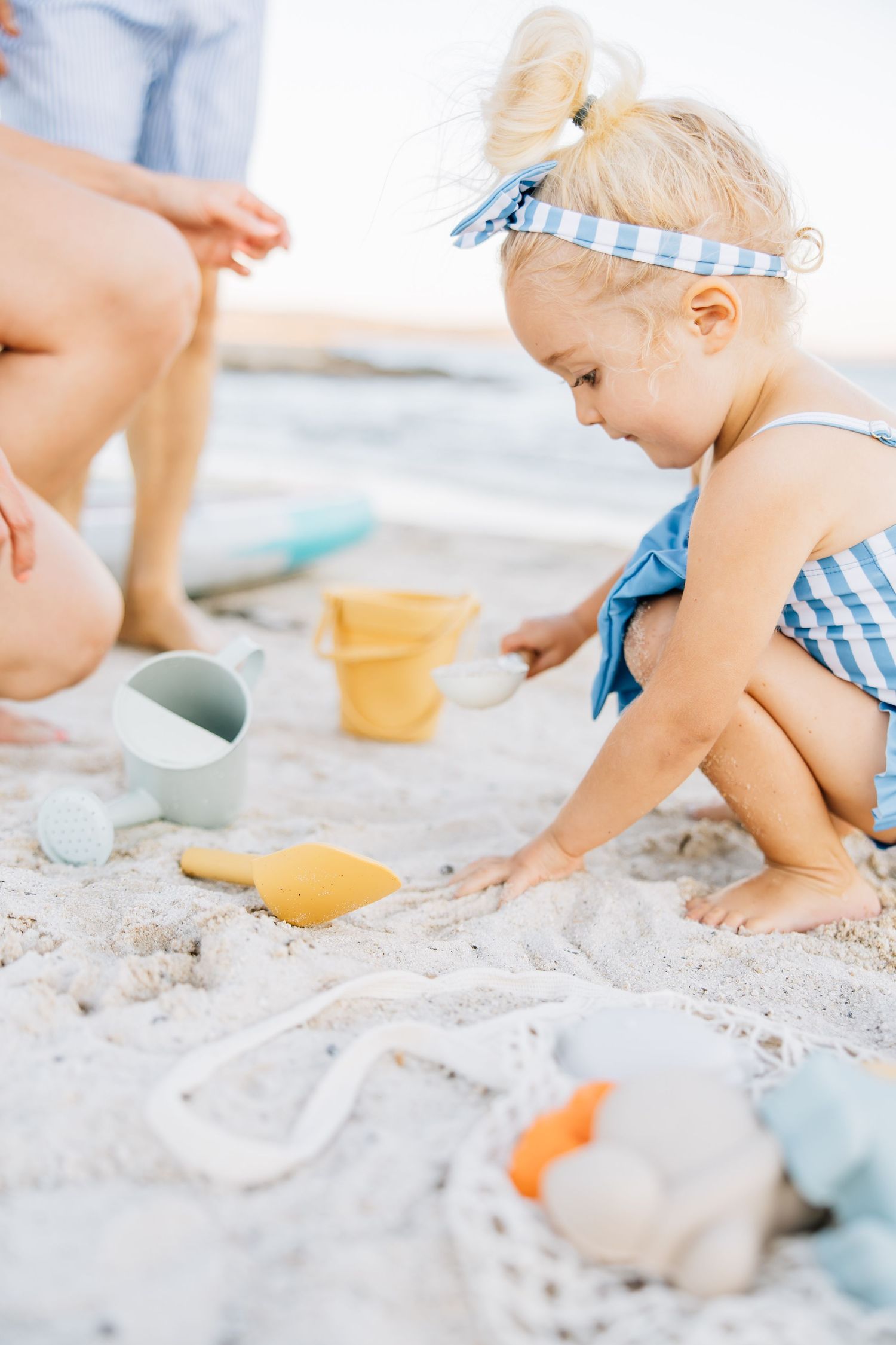 Golden sands, gentle waves, and laughter—this beach session captures authentic family connection and the beauty of moments together.