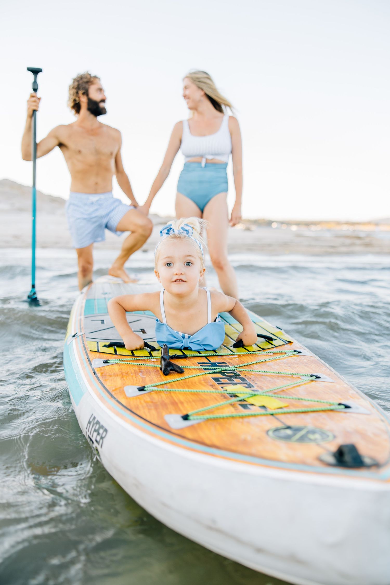 Golden sands, gentle waves, and laughter—this beach session captures authentic family connection and the beauty of moments together.