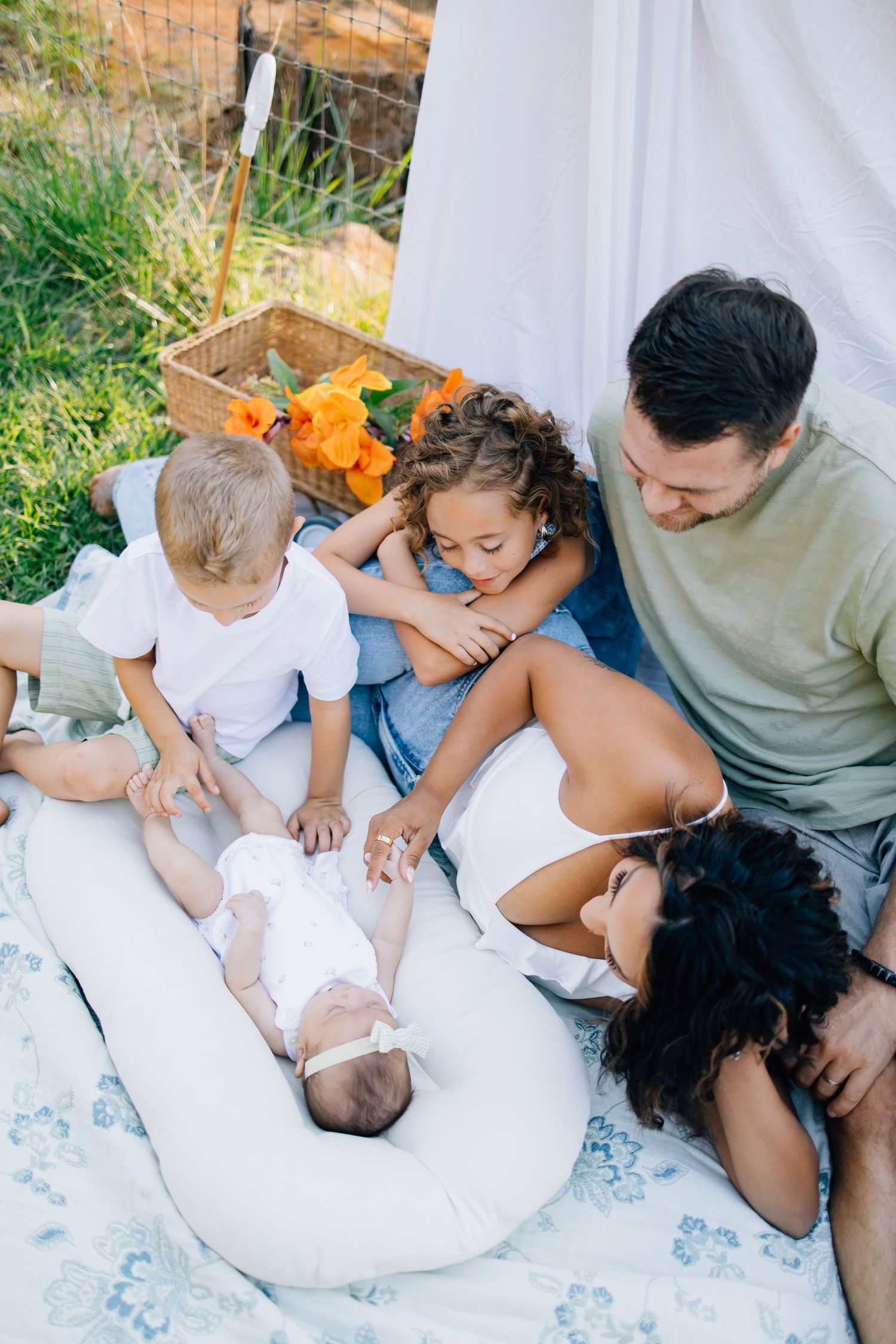 Motherhood unfolds in quiet, fleeting moments—the way tiny hands reach, the laughter that fills a room, the comfort found in familiar arms.