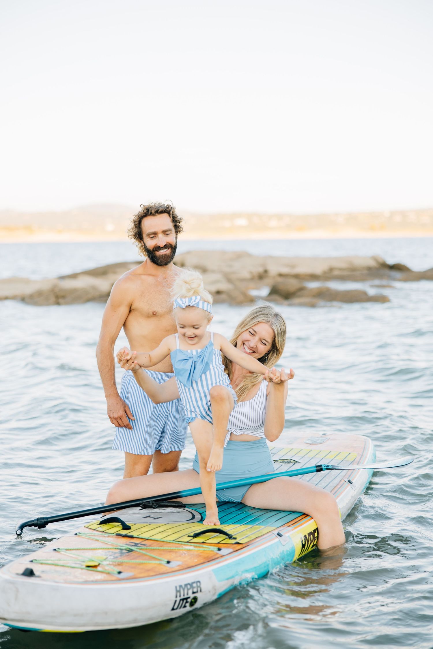 Golden sands, gentle waves, and laughter—this beach session captures authentic family connection and the beauty of moments together.