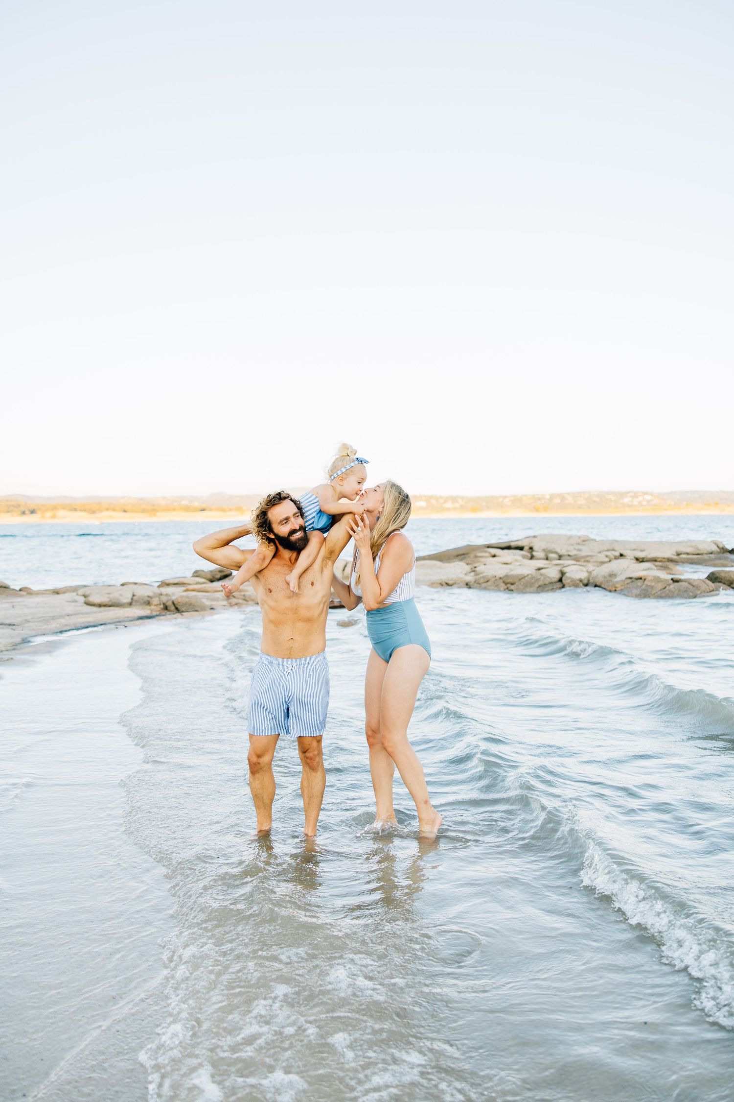 Golden sands, gentle waves, and laughter—this beach session captures authentic family connection and the beauty of moments together.