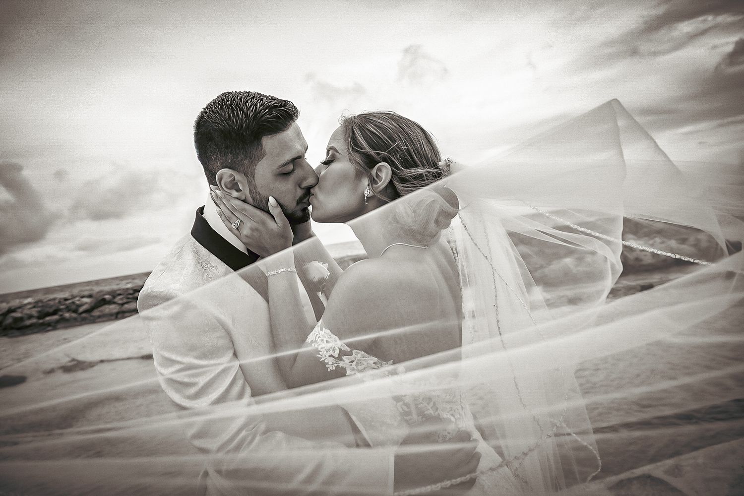 Vintage-inspired black and white photos capturing intimate moments in classic car.
