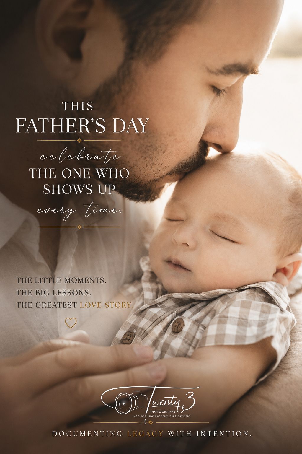 Father tenderly kissing newborn baby's forehead in a Father's Day photography ad by Twenty3 Photography.