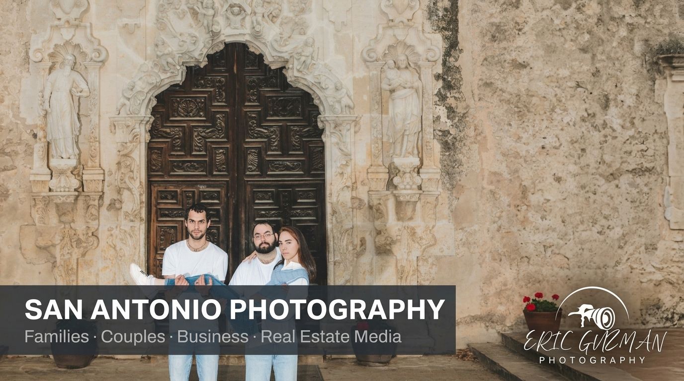 Two men pose in front of an ornate wooden door at a historic San Antonio landmark, captured by Eric Gorman Photography.