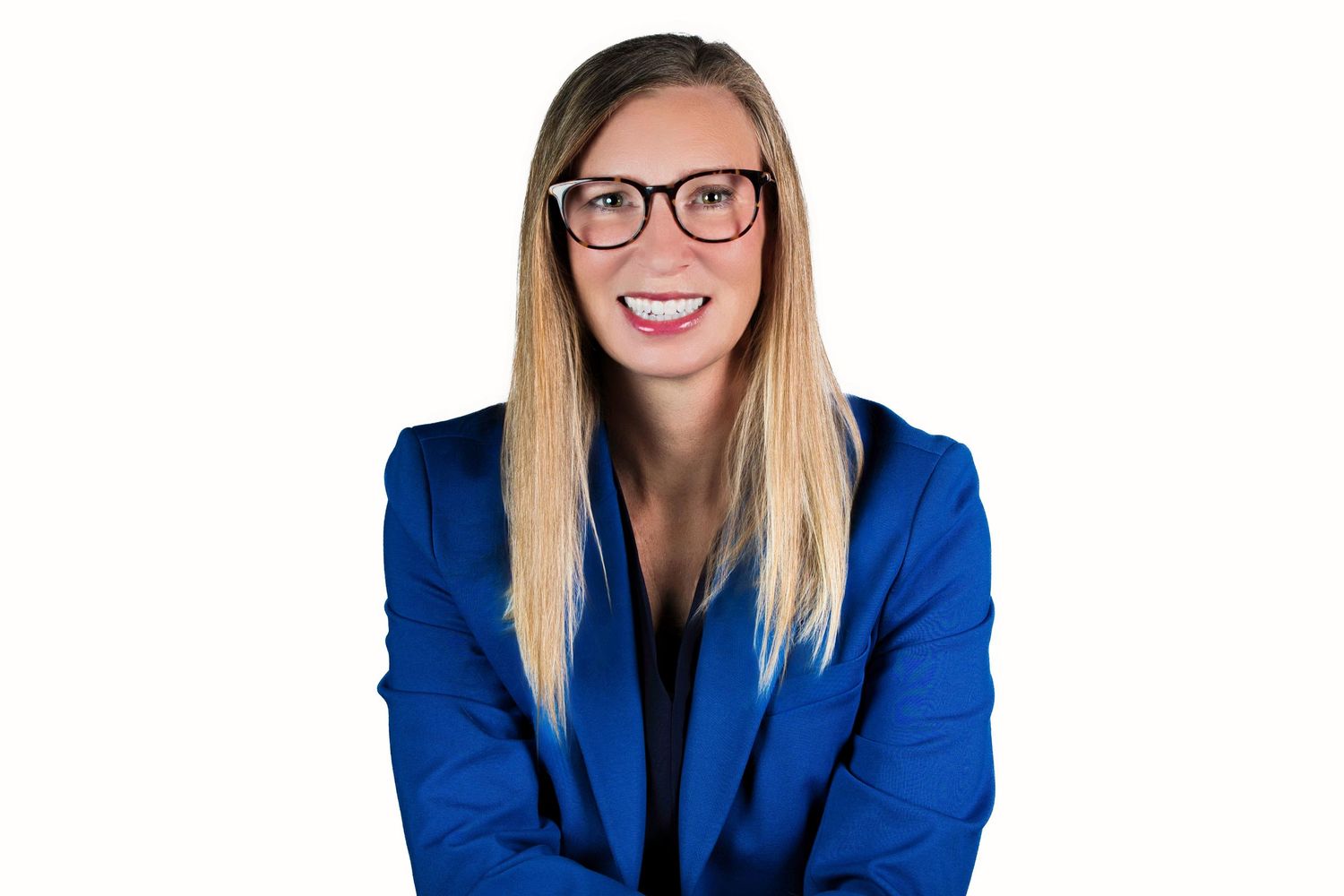 Professional headshots showing a person in a bright blue blazer and glasses against a white background.