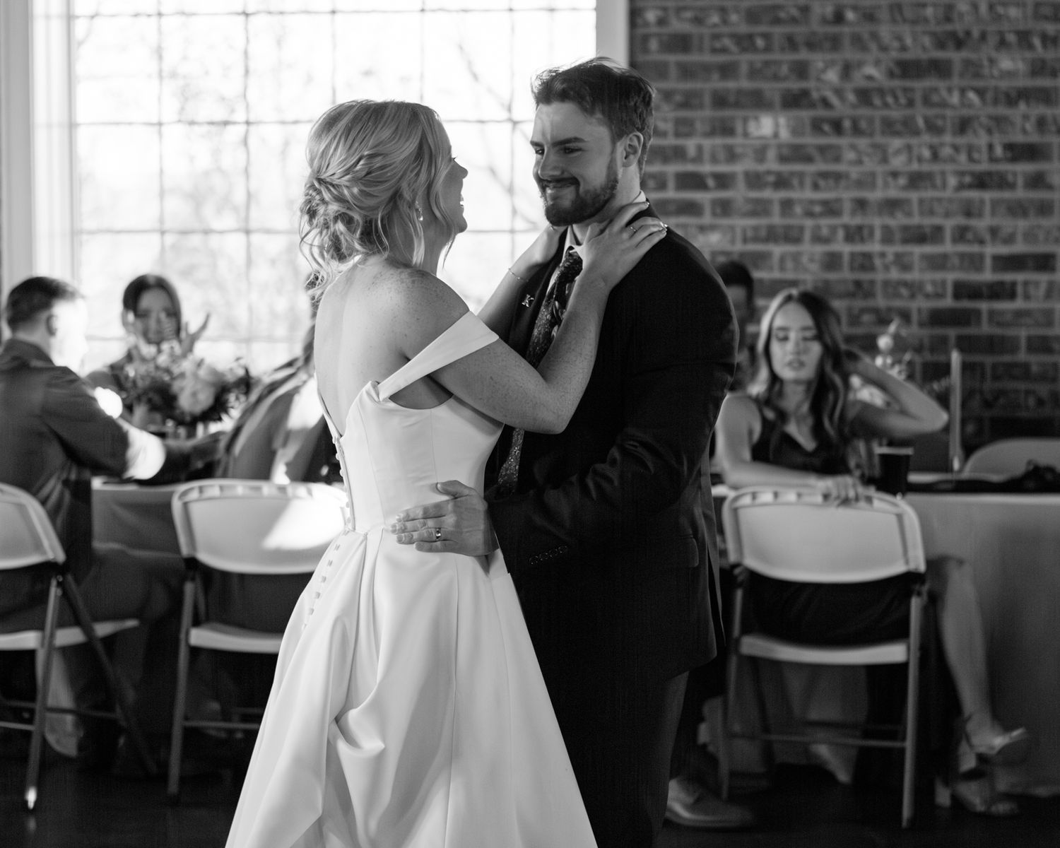 Black and white photos of bride and groom's first dance at their wedding reception