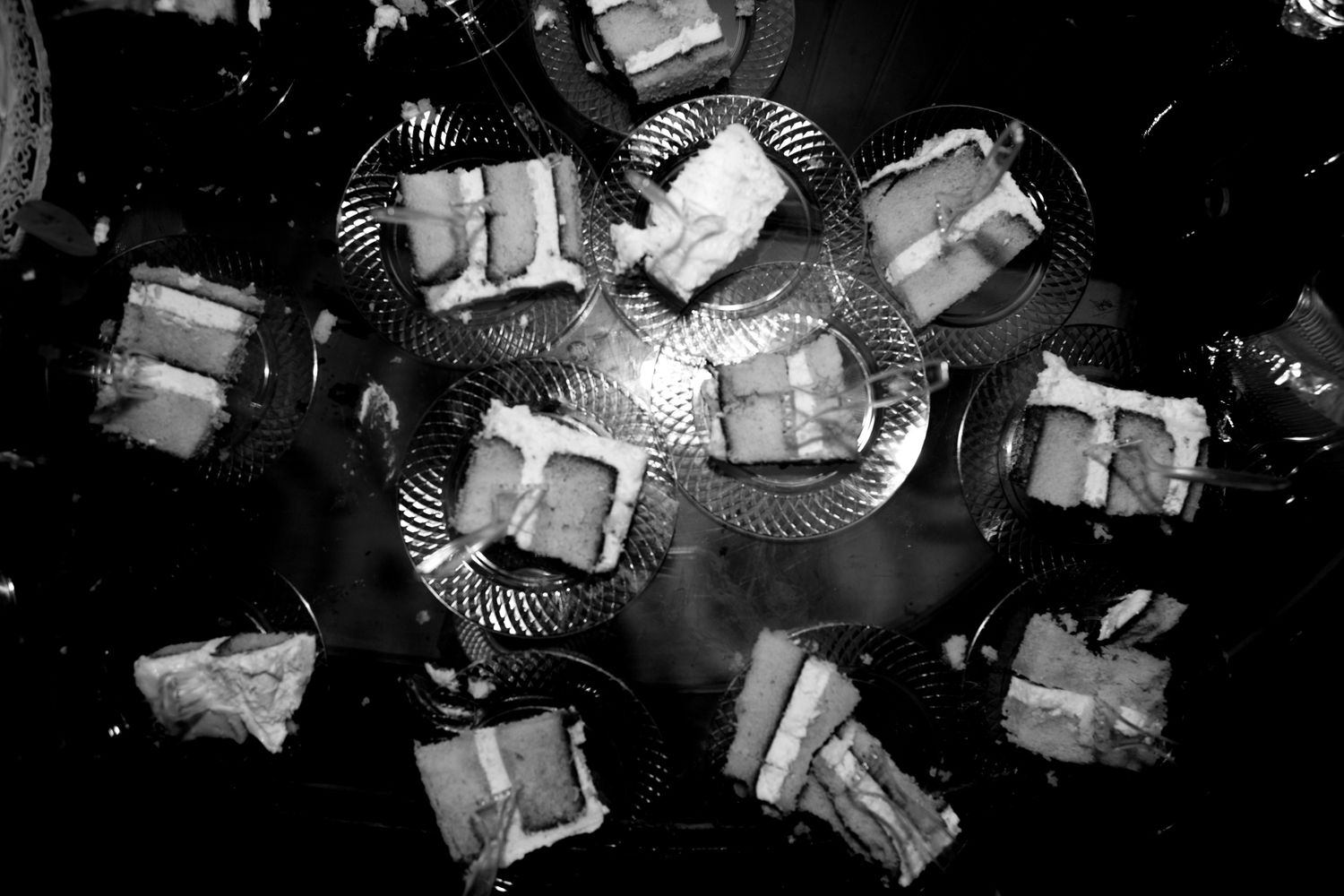 Black and white photograph of cake slices