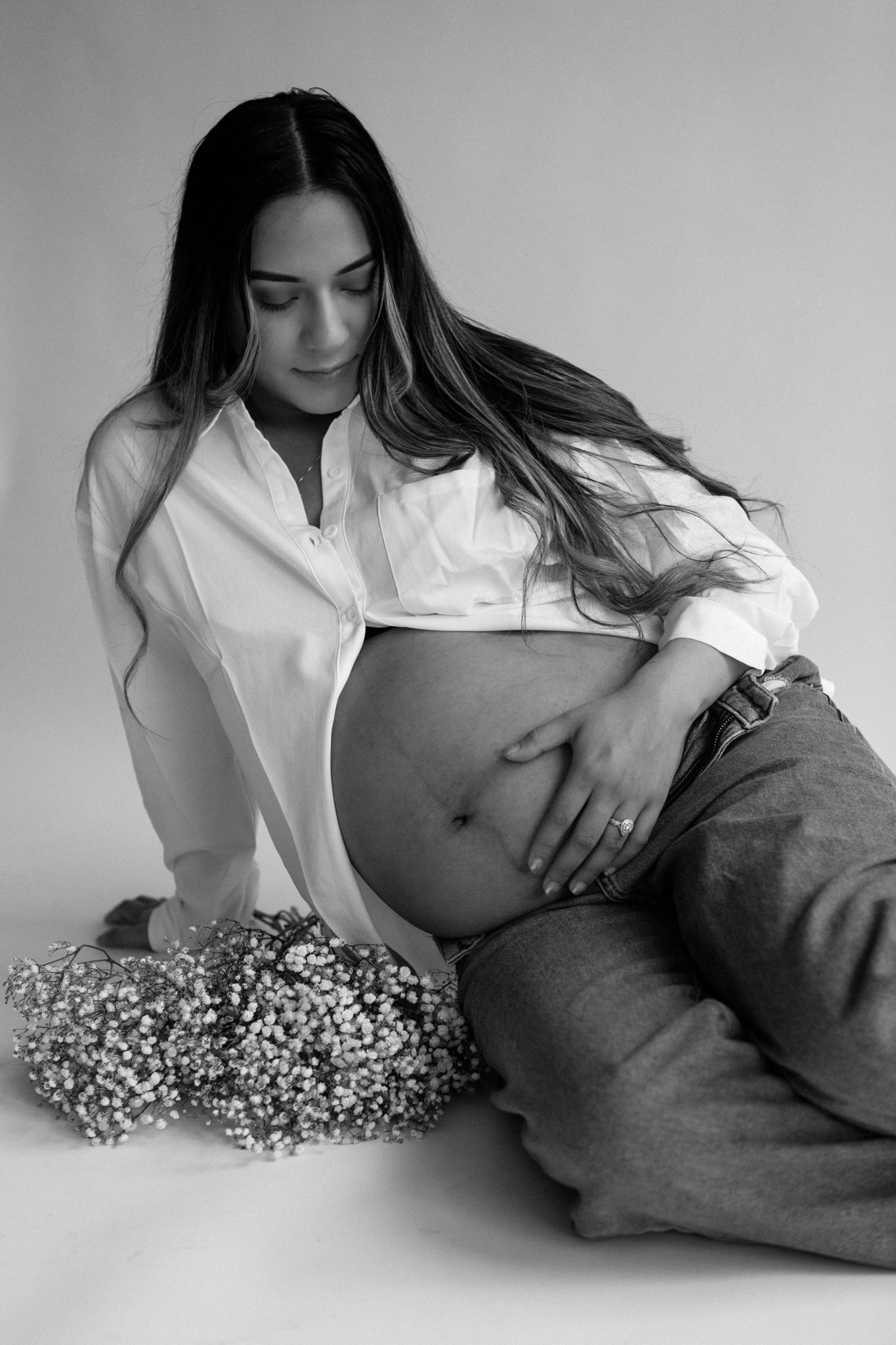 Studio maternity photoshoot with a glowing expectant mother in Louisville, Kentucky. Professional maternity photography