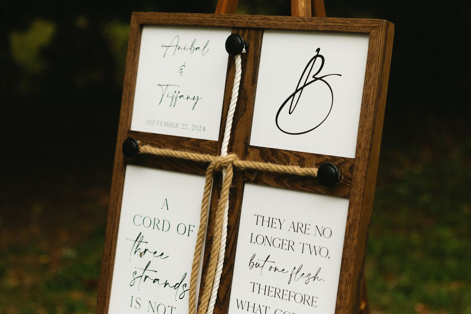 A rustic wooden divided frame displaying multiple wedding-themed quotes and calligraphy designs.