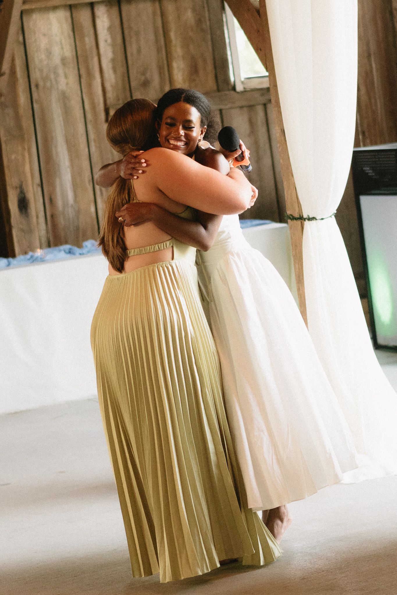 An intimate series of wedding photos showing two people in yellow and white dresses embracing during a special moment.