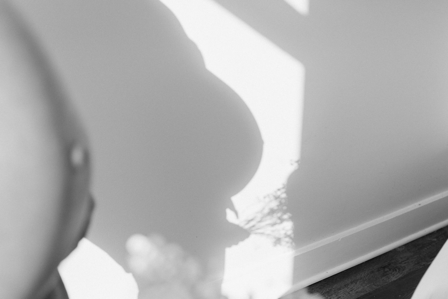 Studio maternity photoshoot with a glowing expectant mother in Louisville, Kentucky. Professional maternity photography