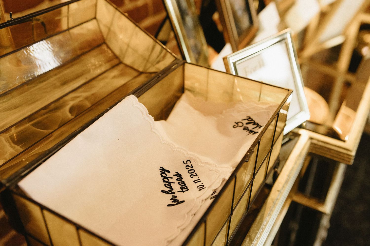 Wedding cards and notes arranged in a rustic display.