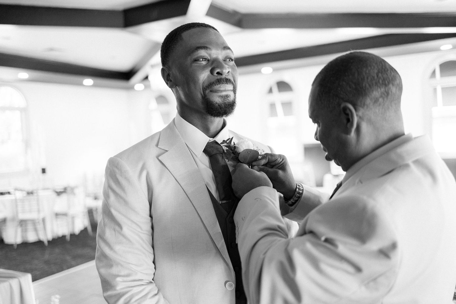 Wedding celebration candid moments captured in black and white photography.