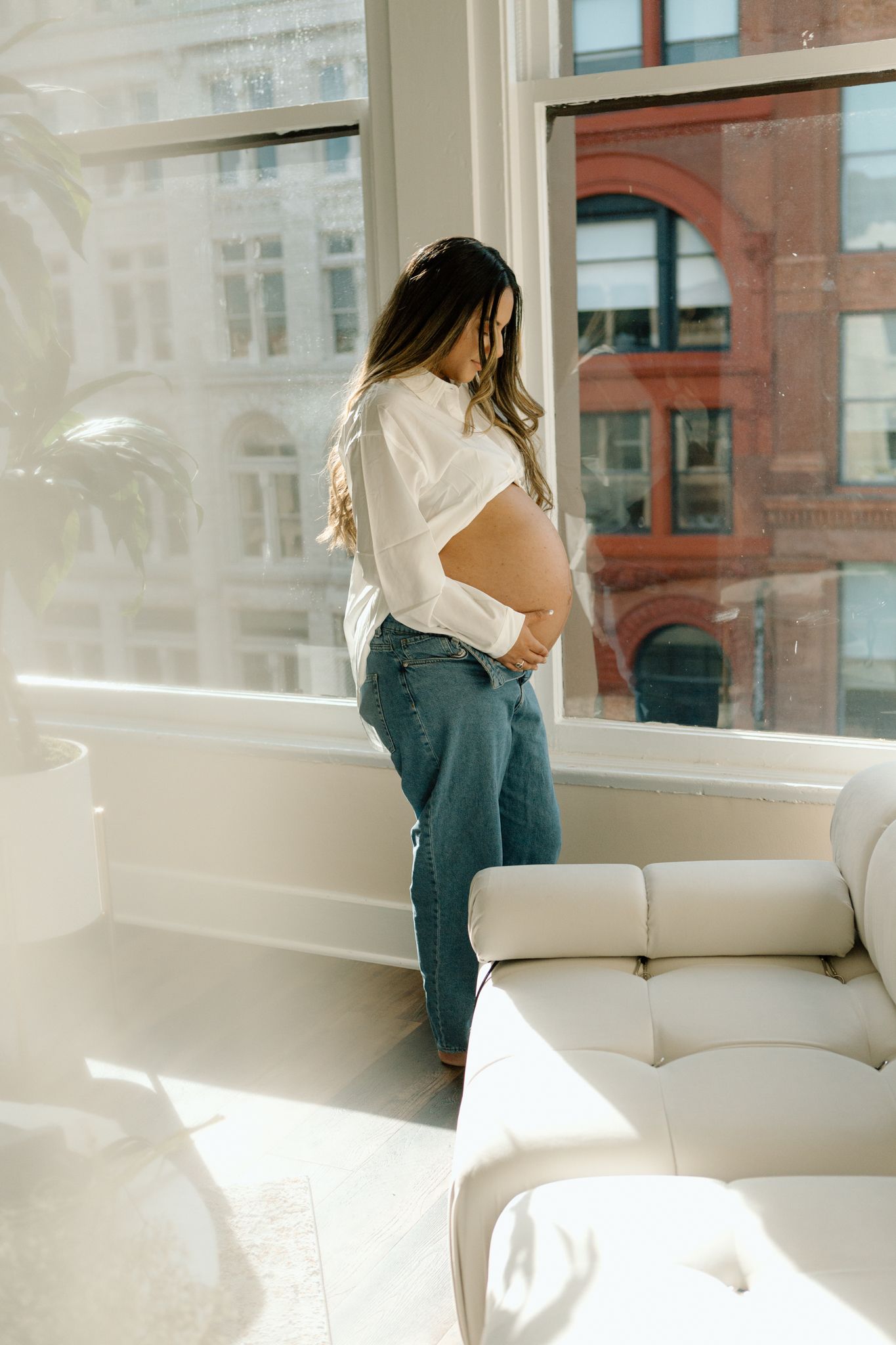 Studio maternity photoshoot with a glowing expectant mother in Louisville, Kentucky. Professional maternity photography