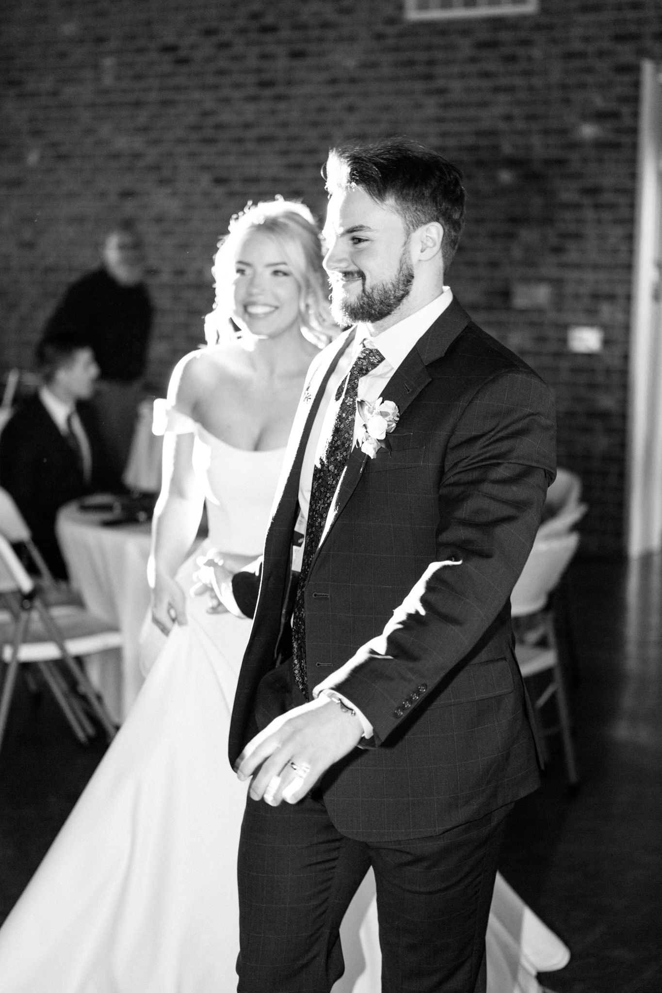 Black and white photos of bride and groom's first dance at their wedding reception