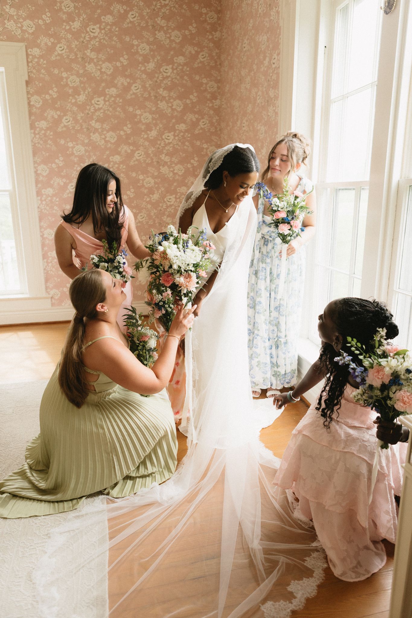 A series of romantic photos showing a bride and her dog sharing tender moments in a sunlit room with floral wallpaper.