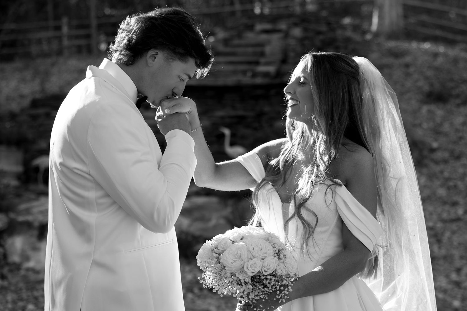 Black and white candid moments of an emotional wedding ceremony.