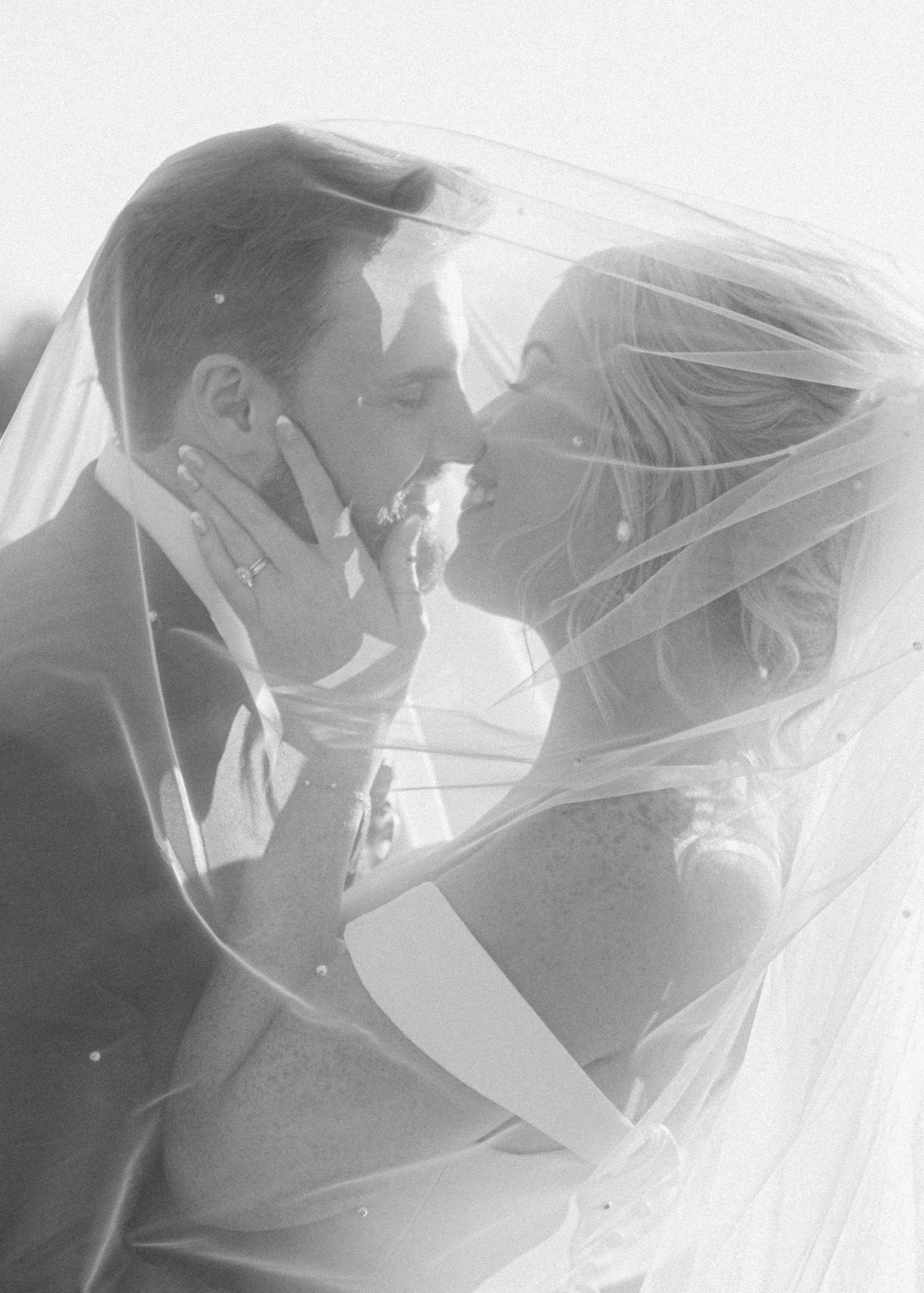 Bride and groom share intimate moment under veil at Silo Farms, Kentucky