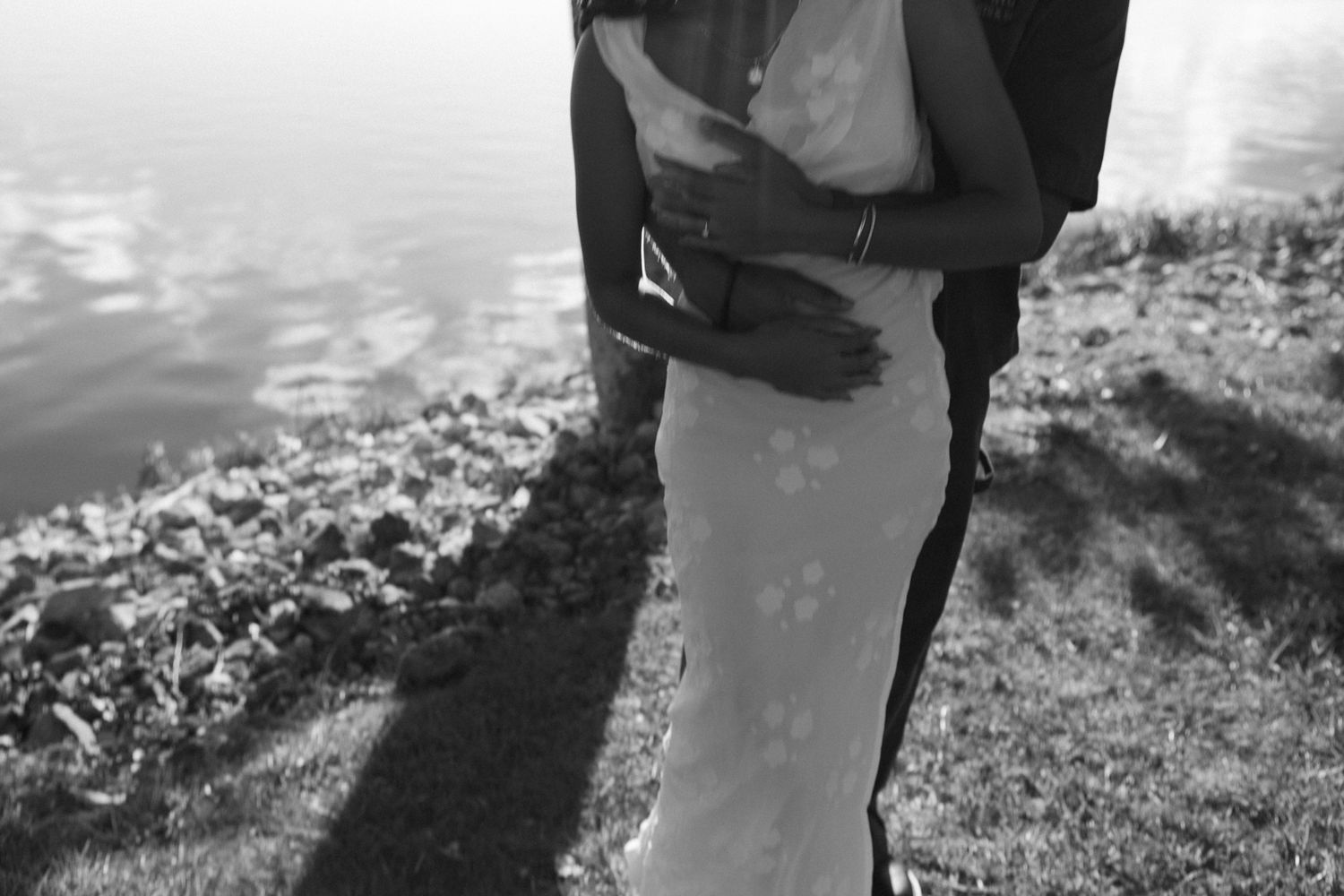 Romantic proposal at a lakeside location in Lexington, Kentucky, with a young Black couple.