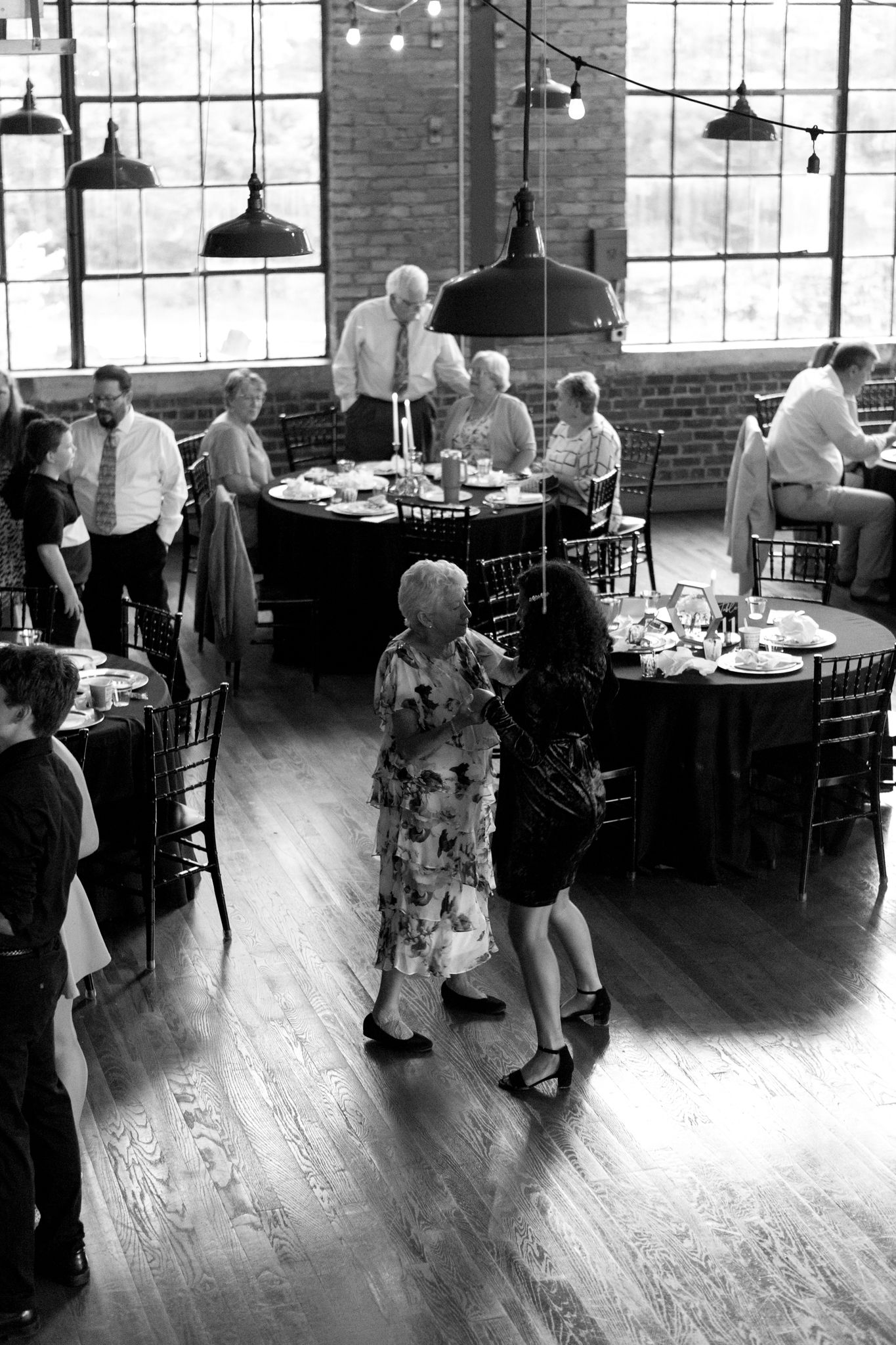 Guests dancing joyfully at a lively wedding reception in Kentucky