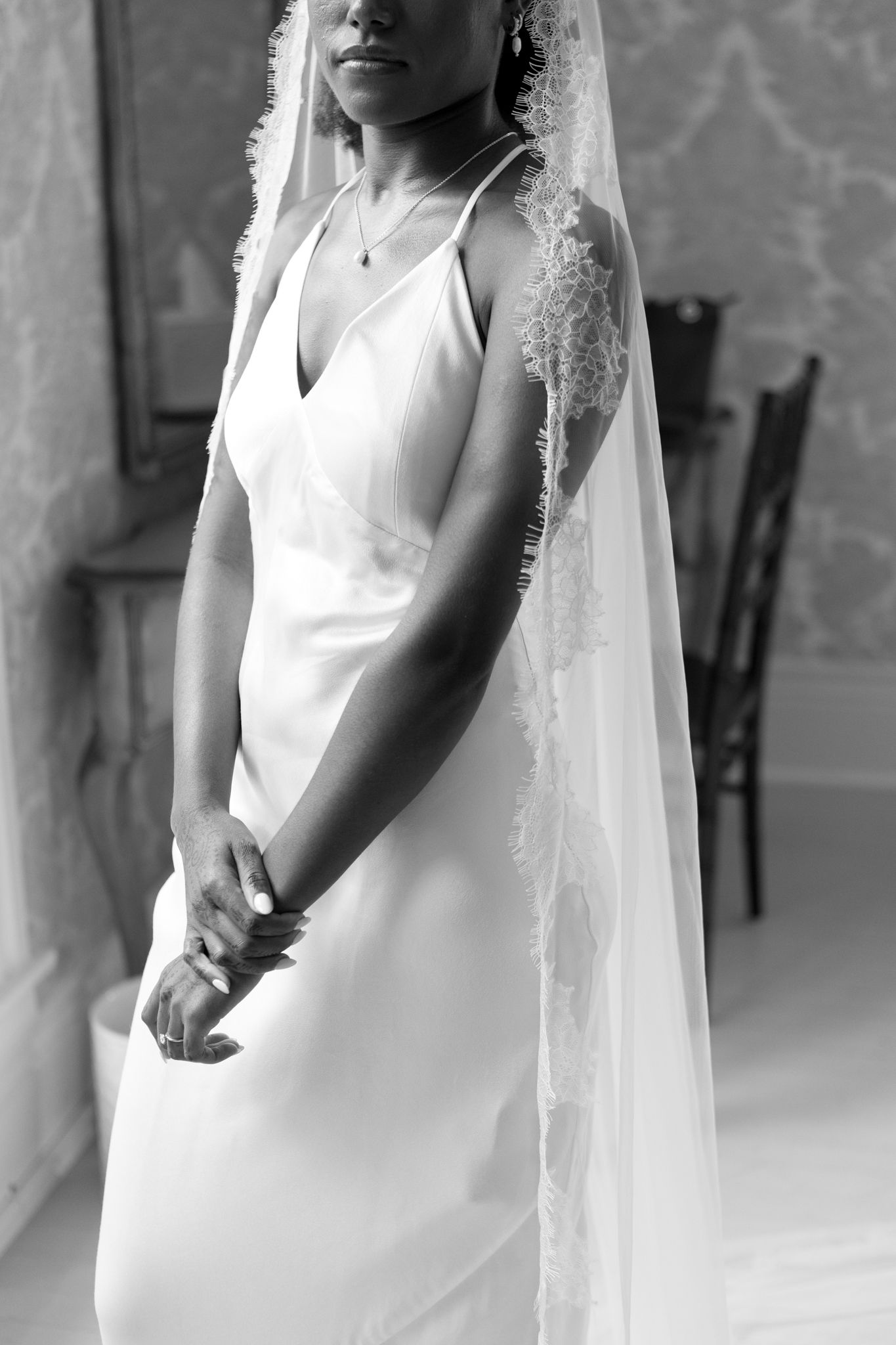 A sequence of elegant bridal portraits showing a flowing white wedding gown and veil against a light background.