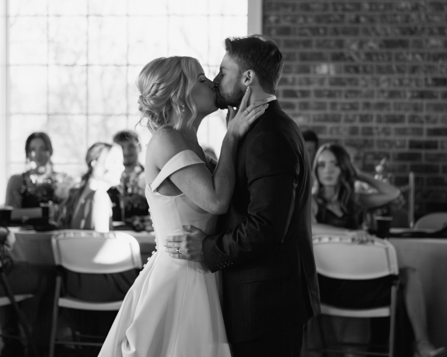 Black and white photos of bride and groom's first dance at their wedding reception
